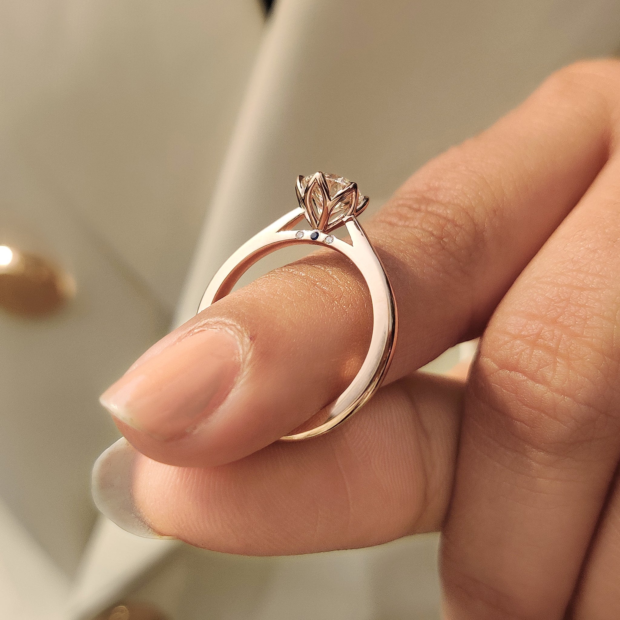 Blue sapphire hidden accent diamond ring style.
