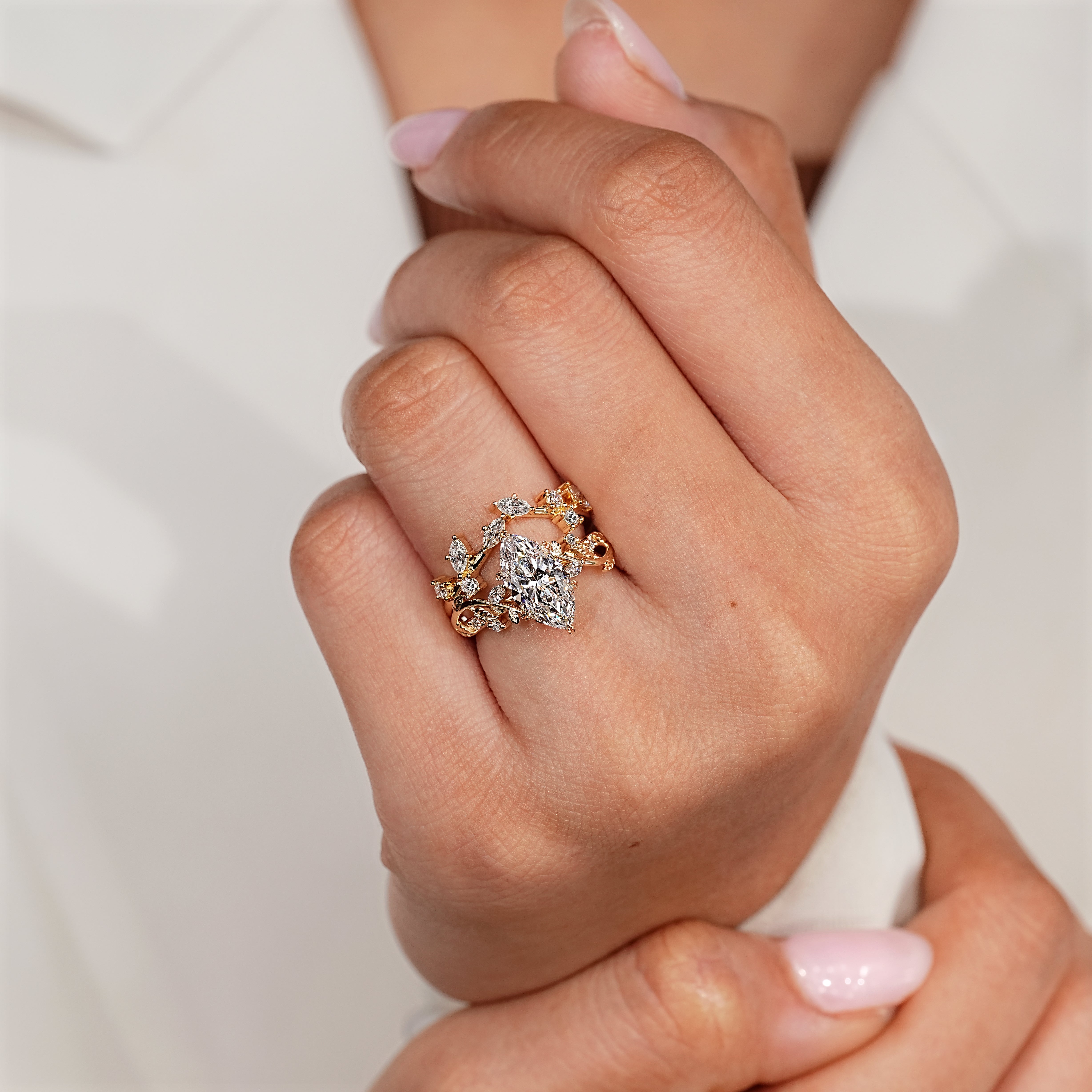 Marquise and round diamond matching wedding band.

