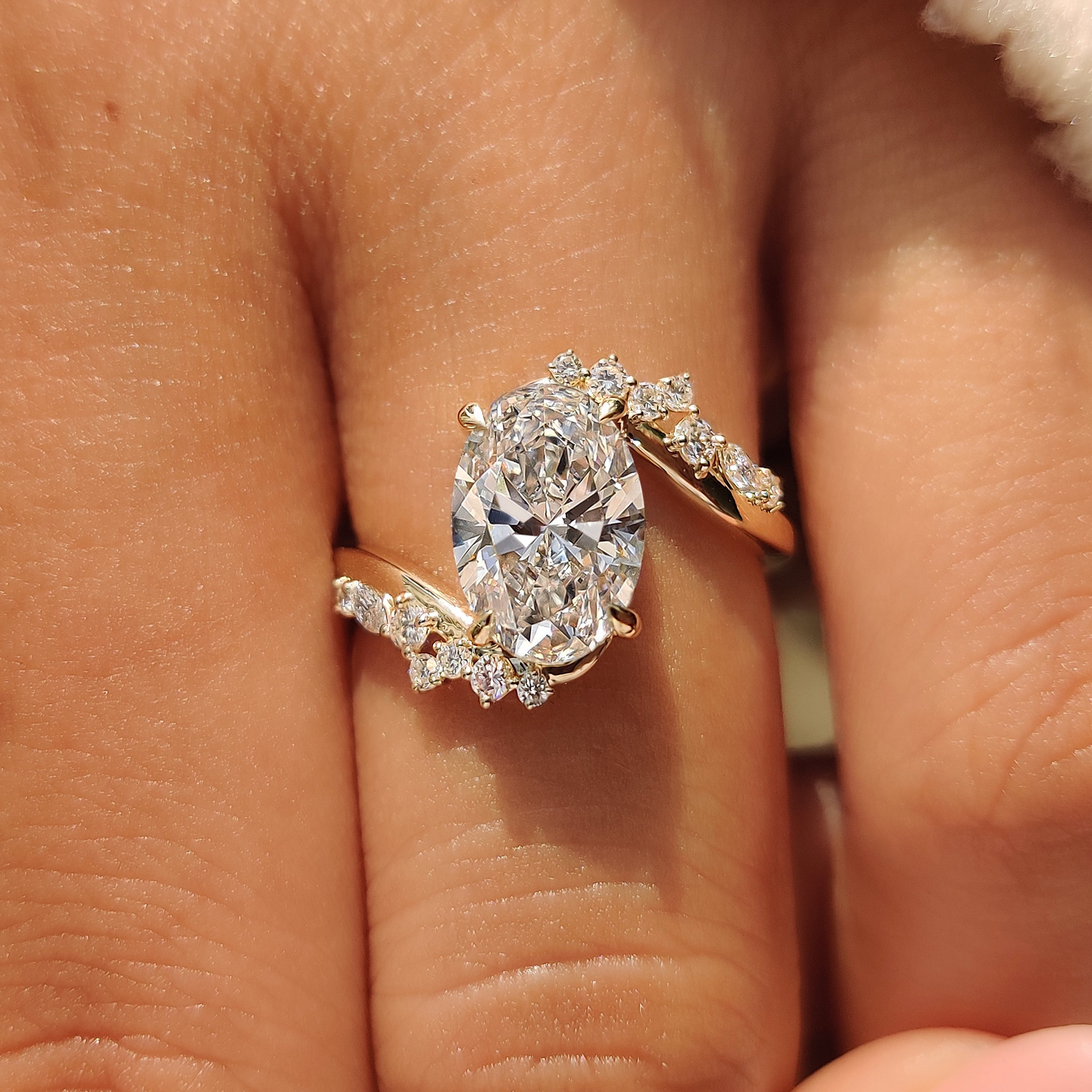 Open gallery setting on an oval cut diamond ring.
