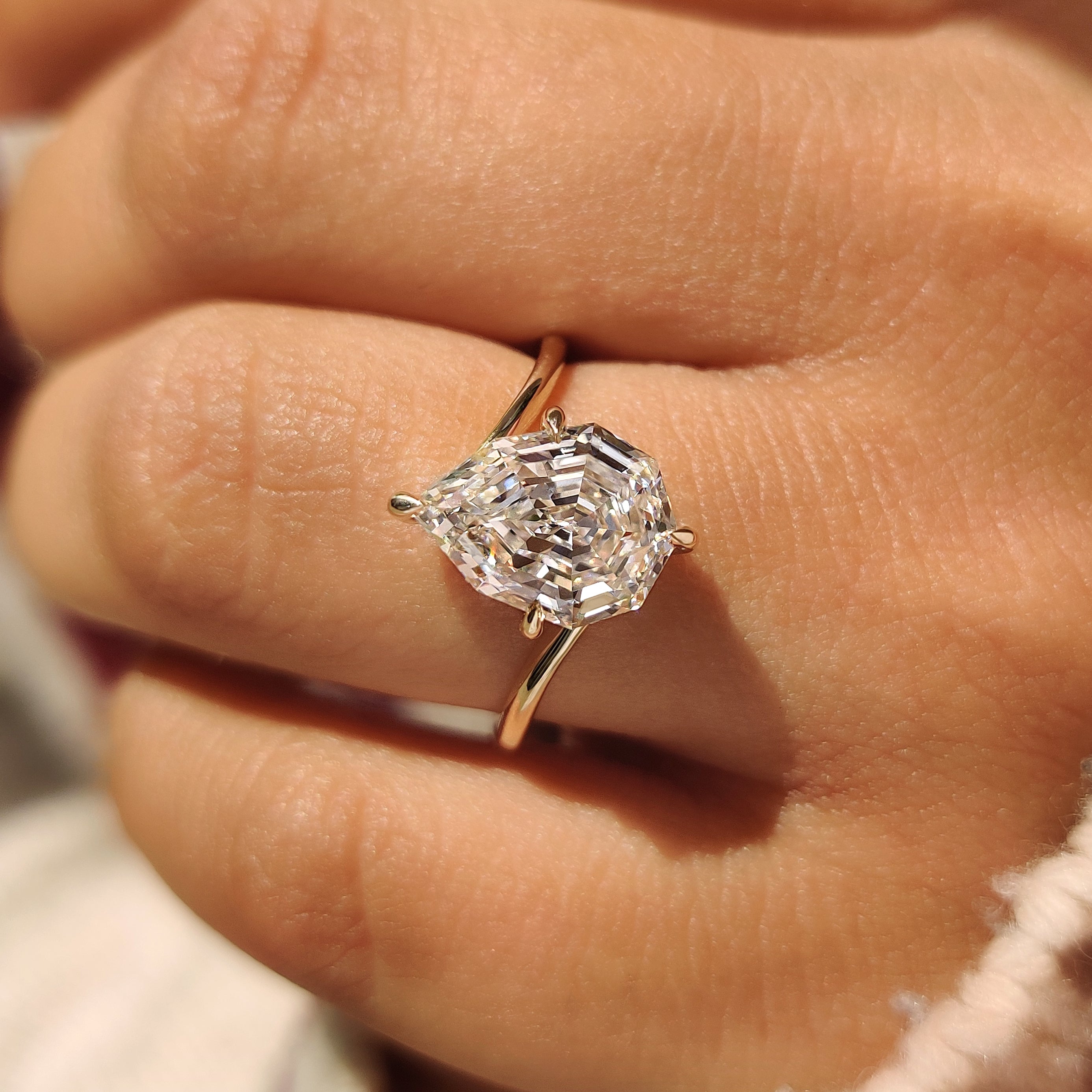 IGI certified pear diamond ring with bypass setting.
