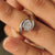 Handmade Portuguese diamond ring with half bezel solitaire setting.
