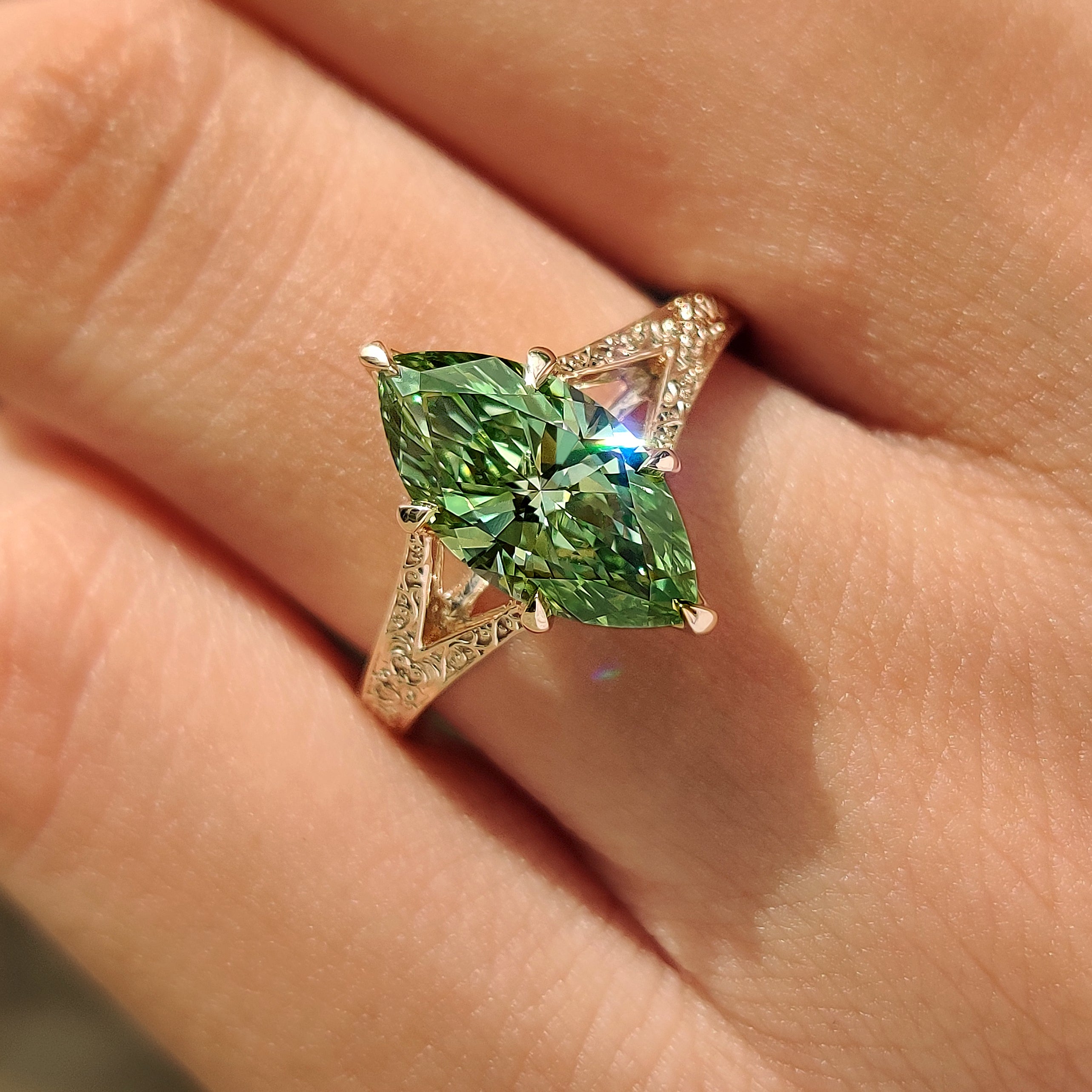 Green marquise lab grown diamond ring with split shank