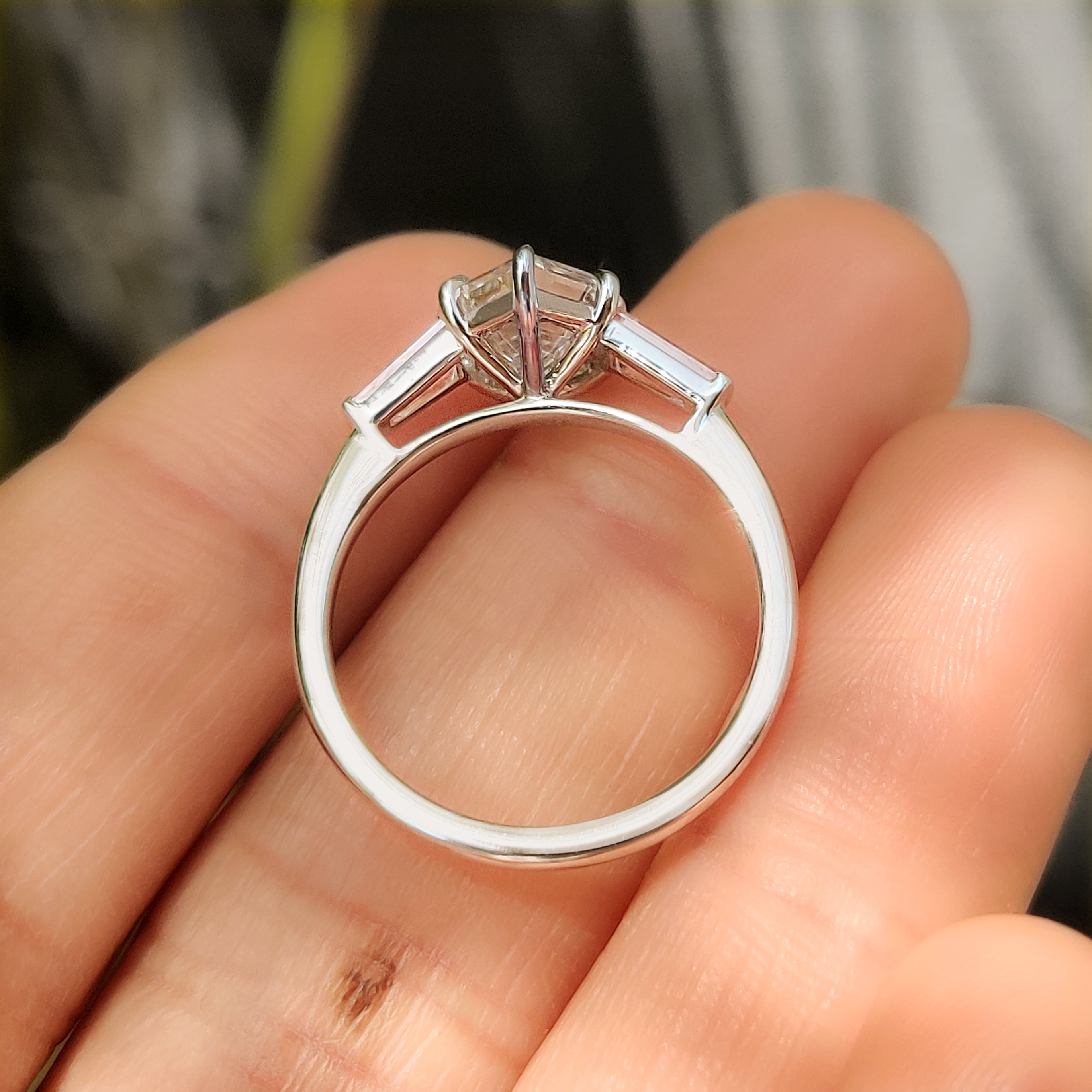 Carat Diamonds three stone ring with cathedral setting
