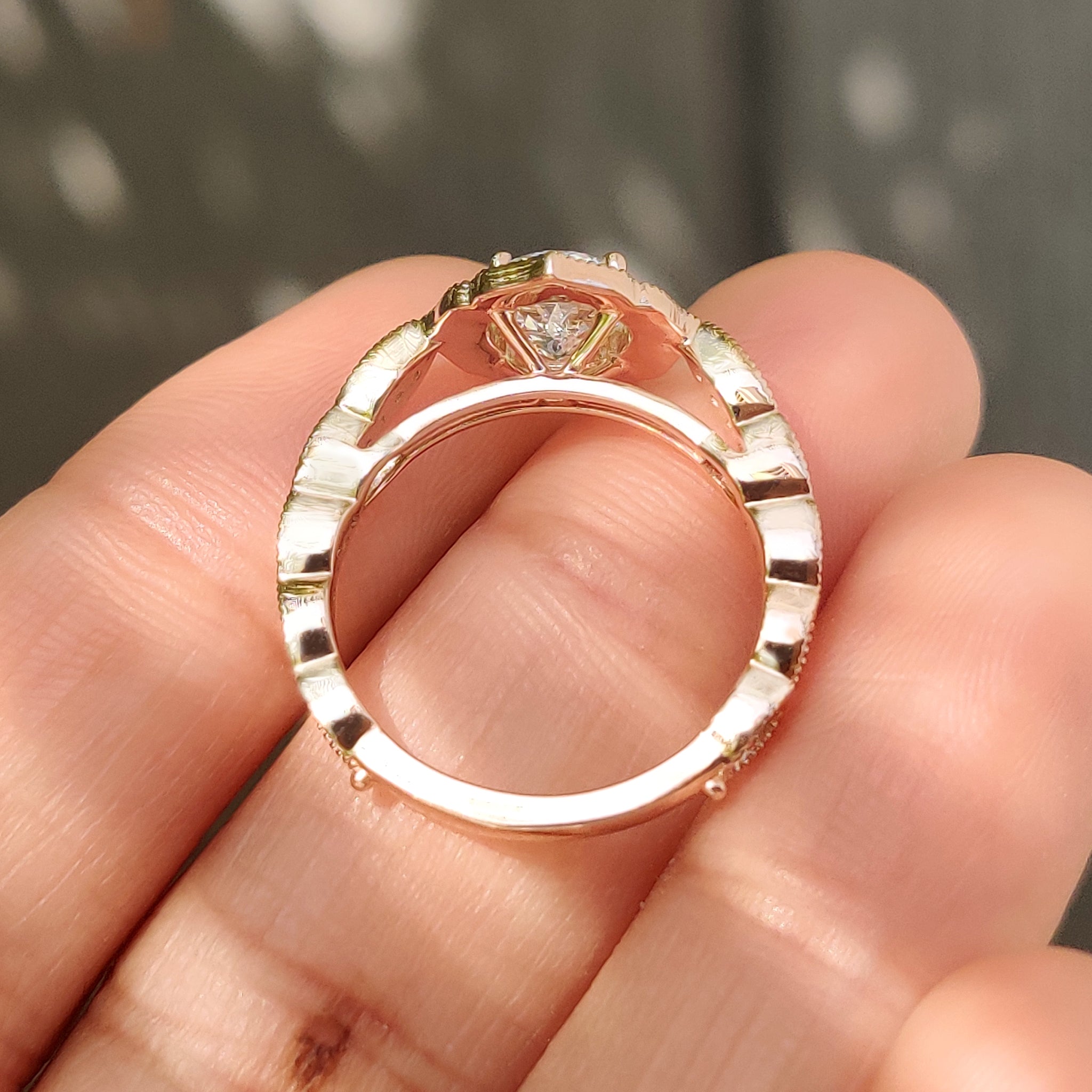 Handmade lab grown Portuguese diamond ring with halo setting.
