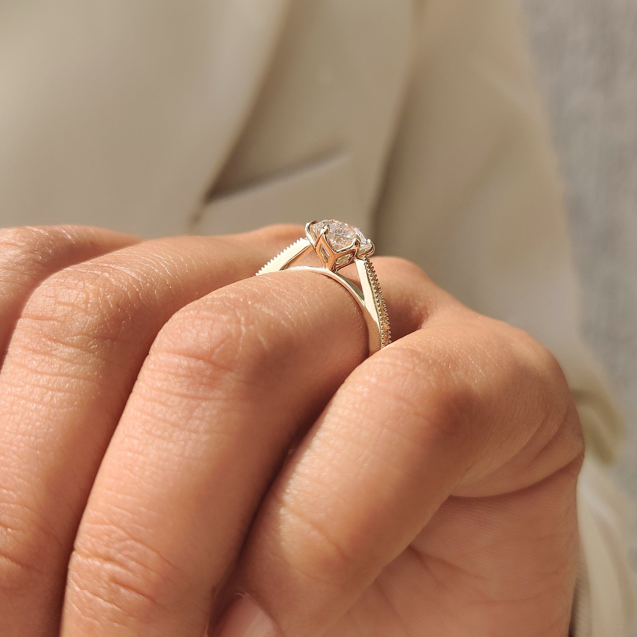 Handmade round diamond ring with tulip basket and milgrain
