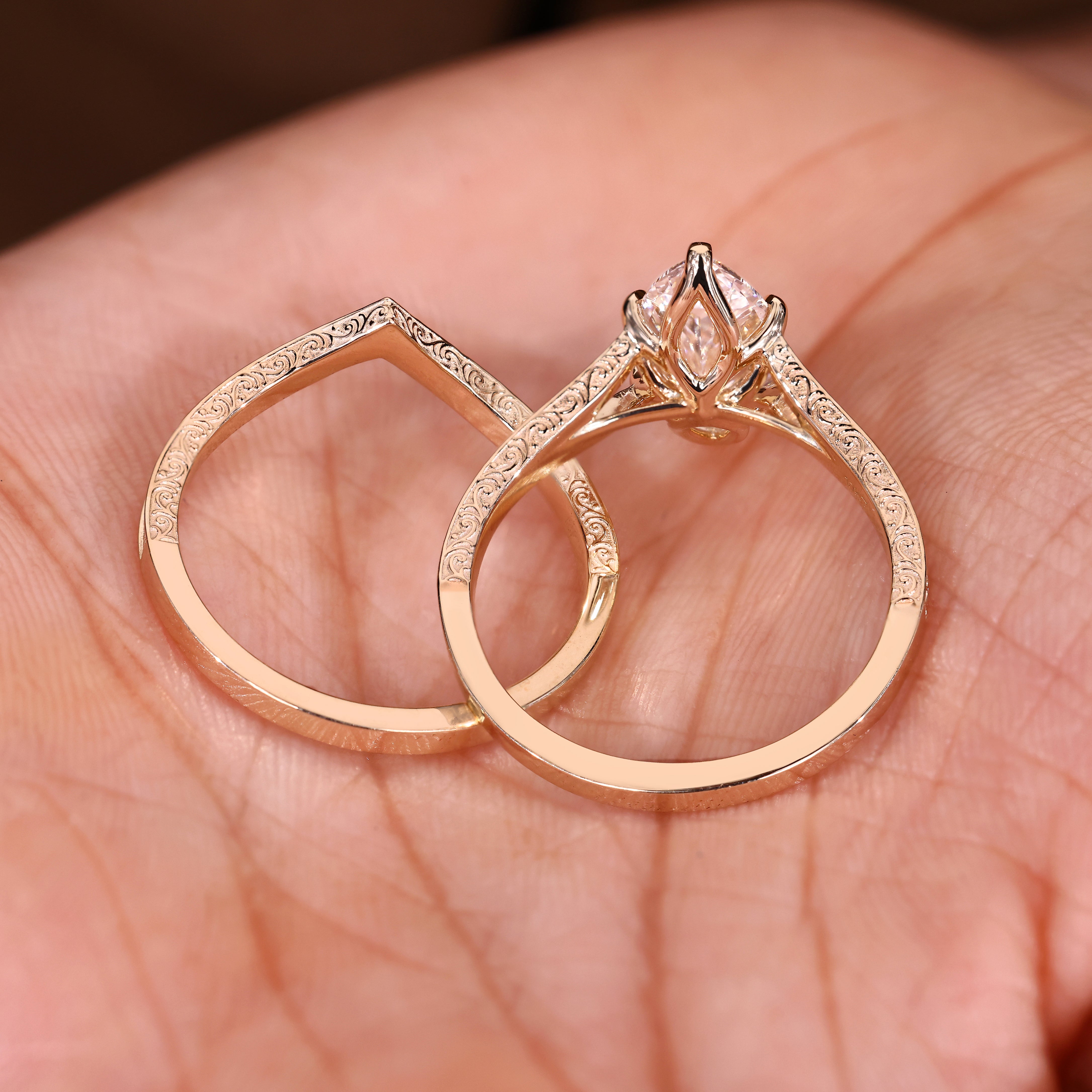 Vintage marquise solitaire engagement ring with a matching bridal band set
