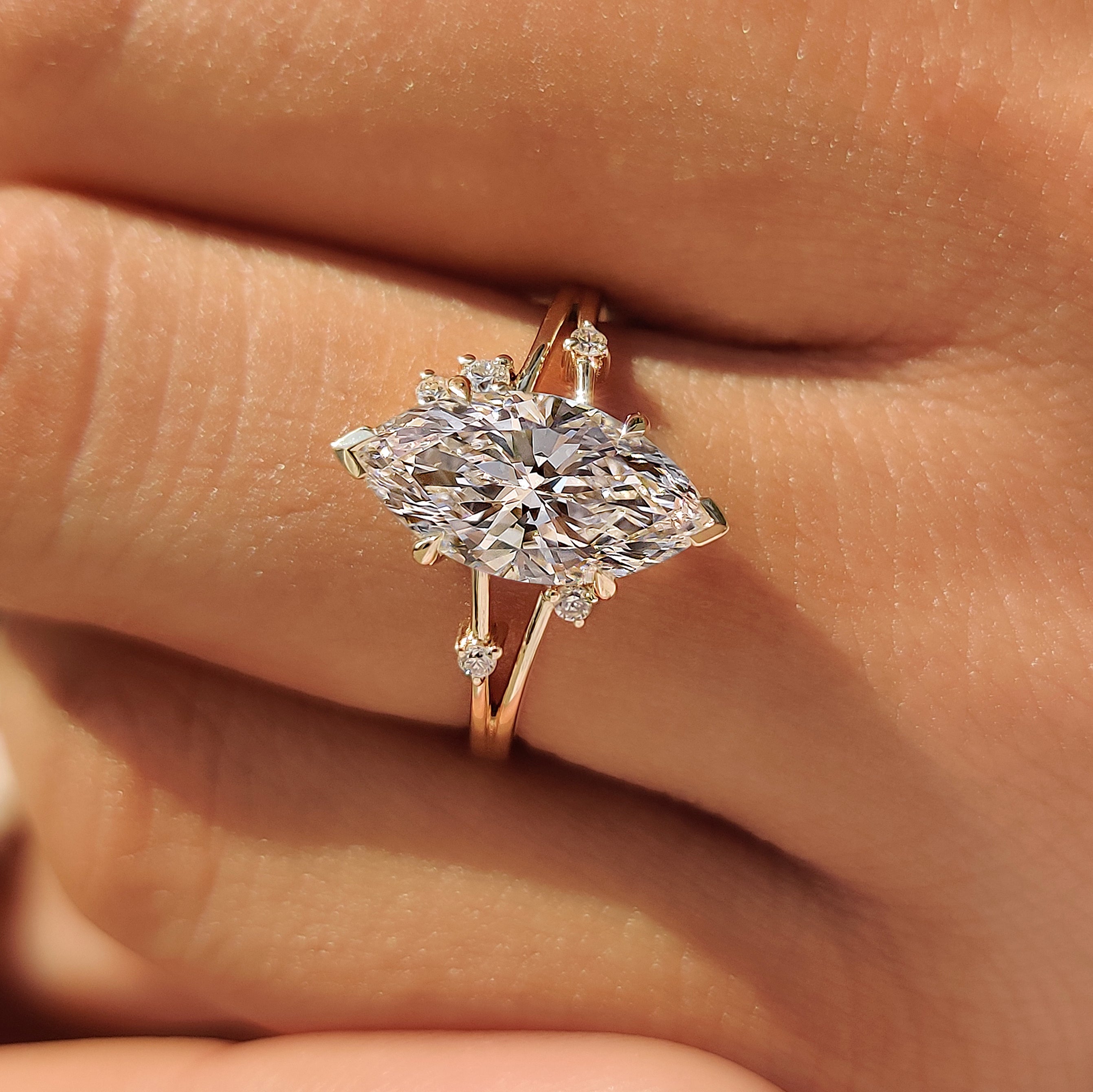 IGI certified 2.00 carat marquise cut diamond ring with split shank.
