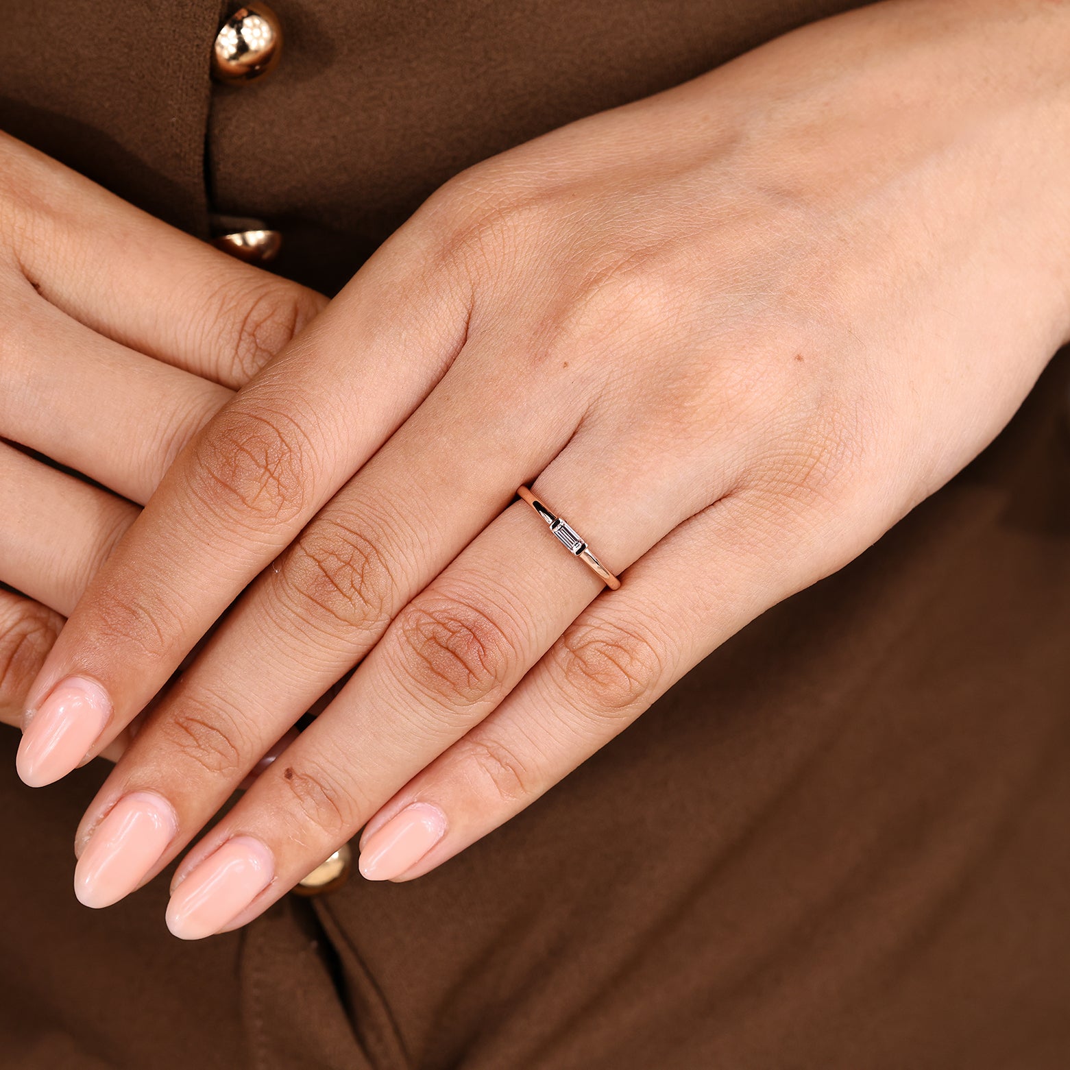 Carat Diamonds baguette wedding band with bezel setting
