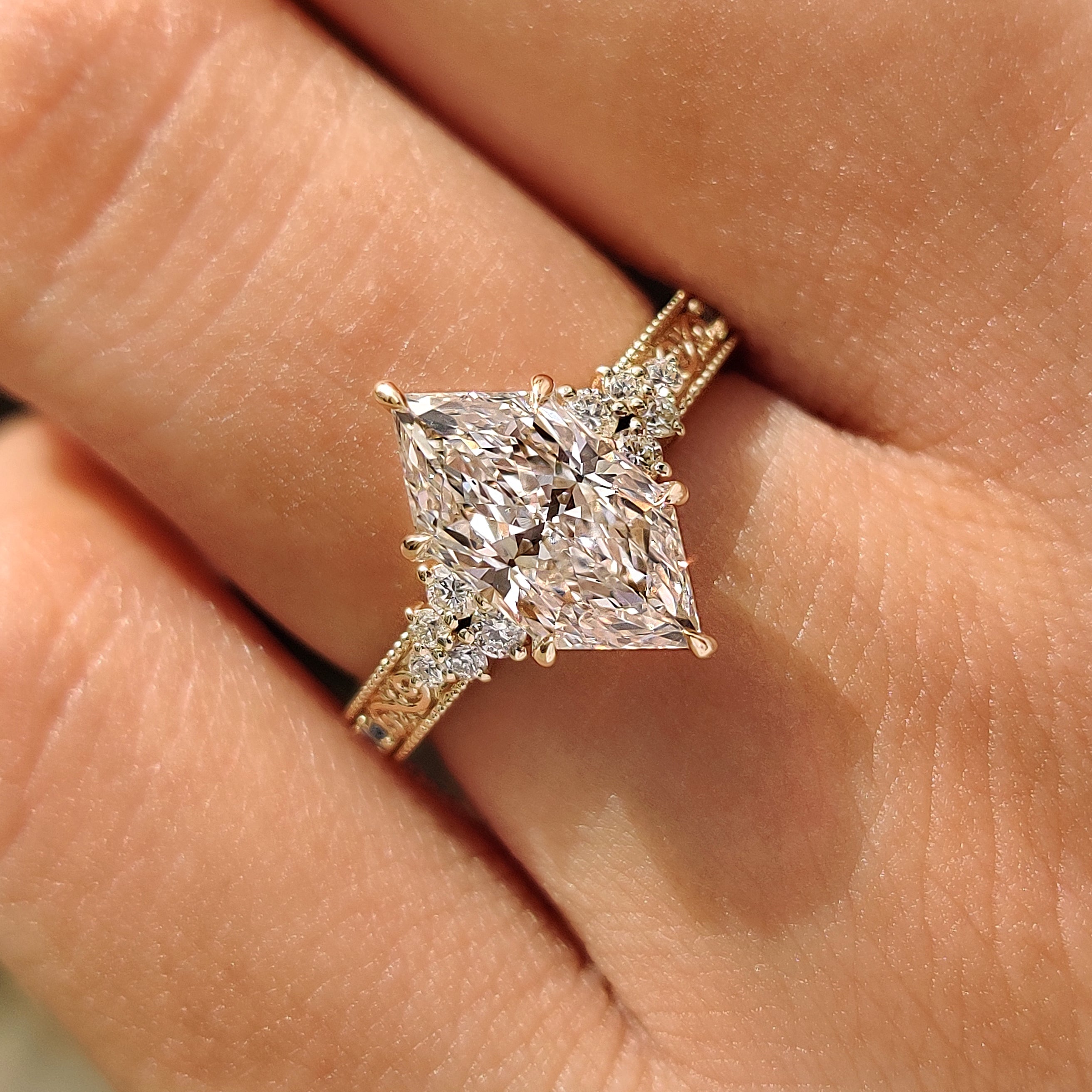 Dutch marquise ring with six claw prong setting
