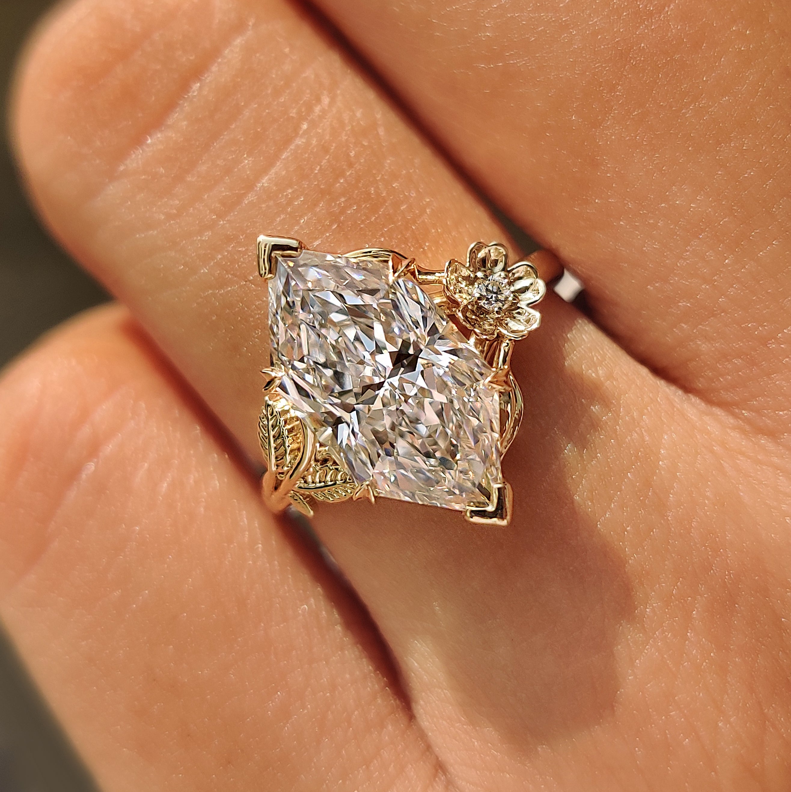 Nature inspired engagement ring with branching details.
