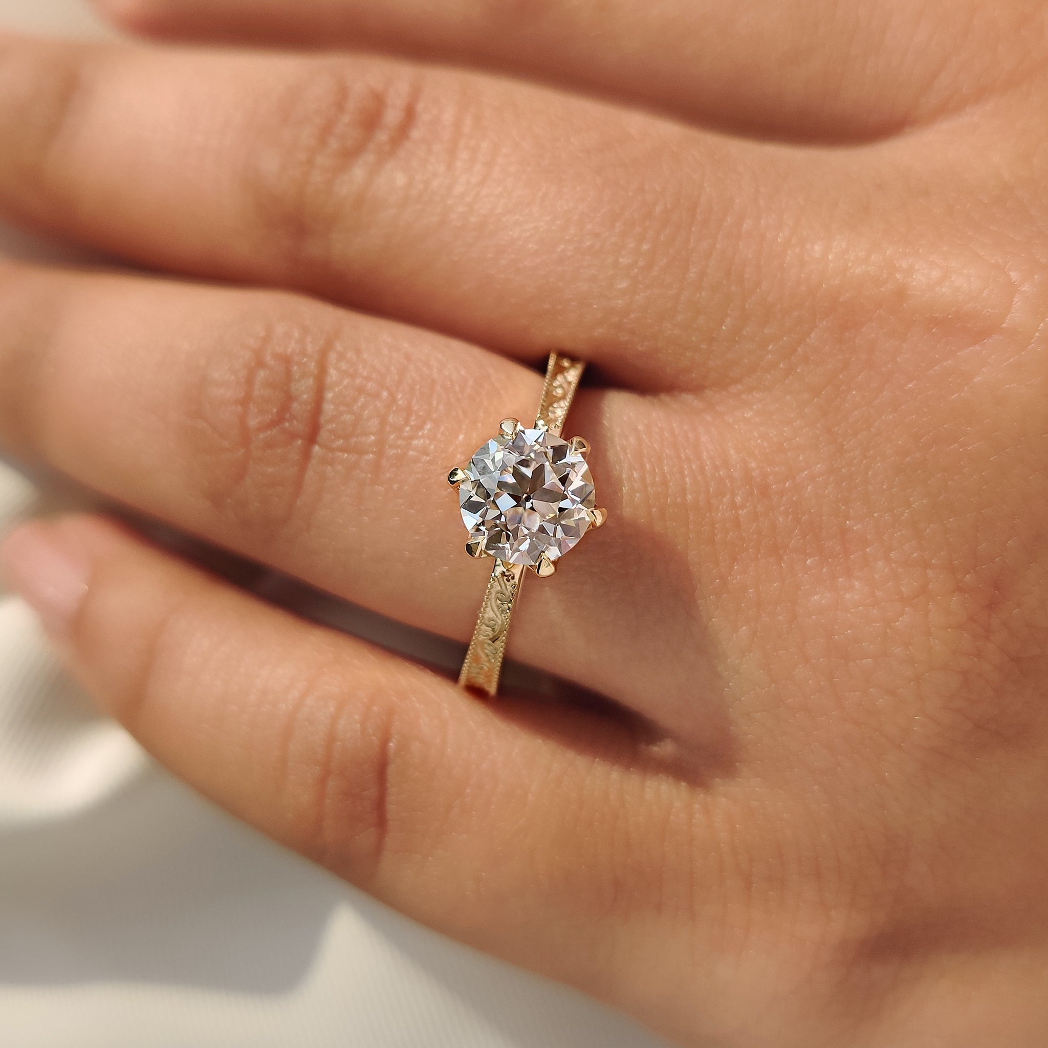 Lab grown old European cut round diamond ring with milgrain detail
