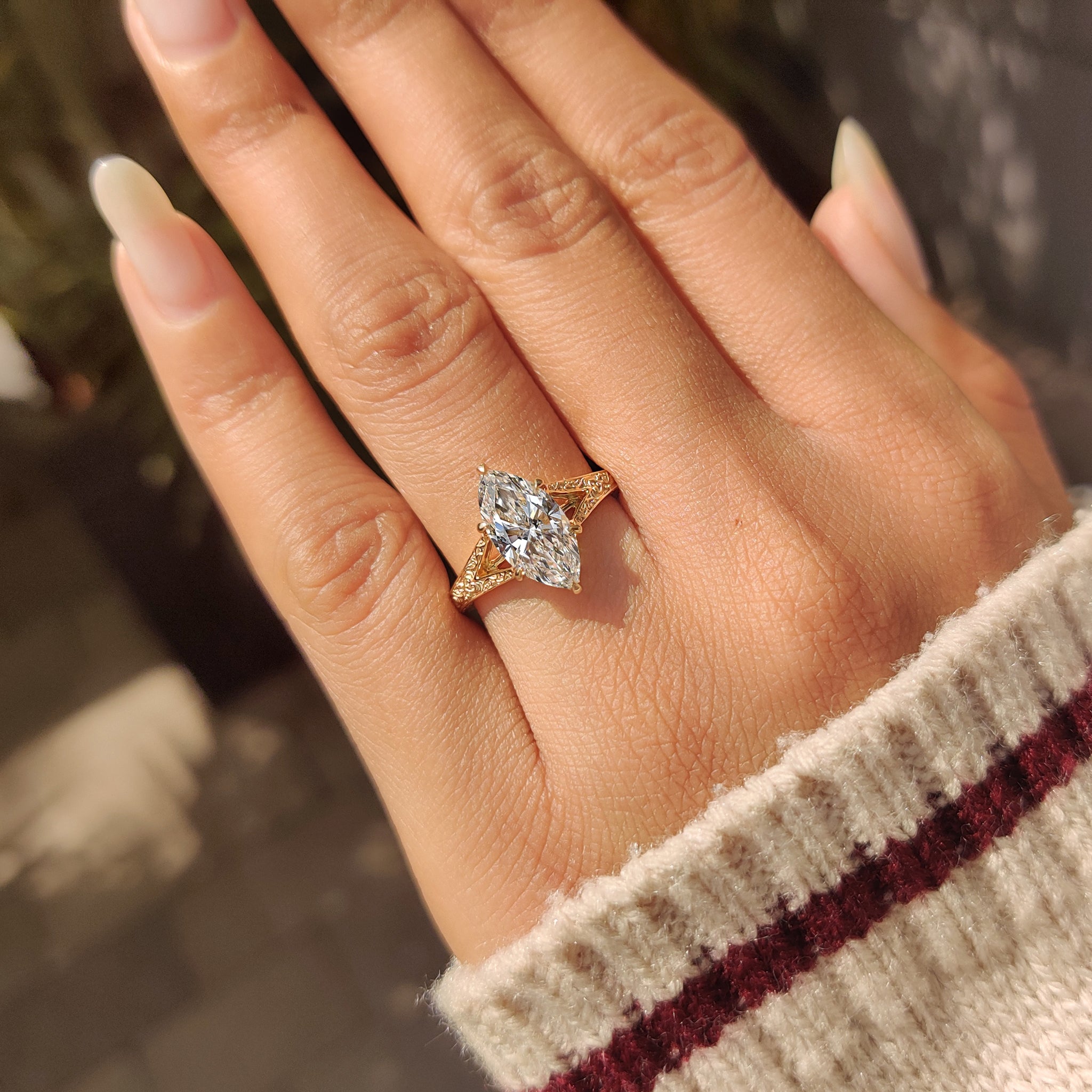 Marquise diamond vintage ring with six claw prong setting
