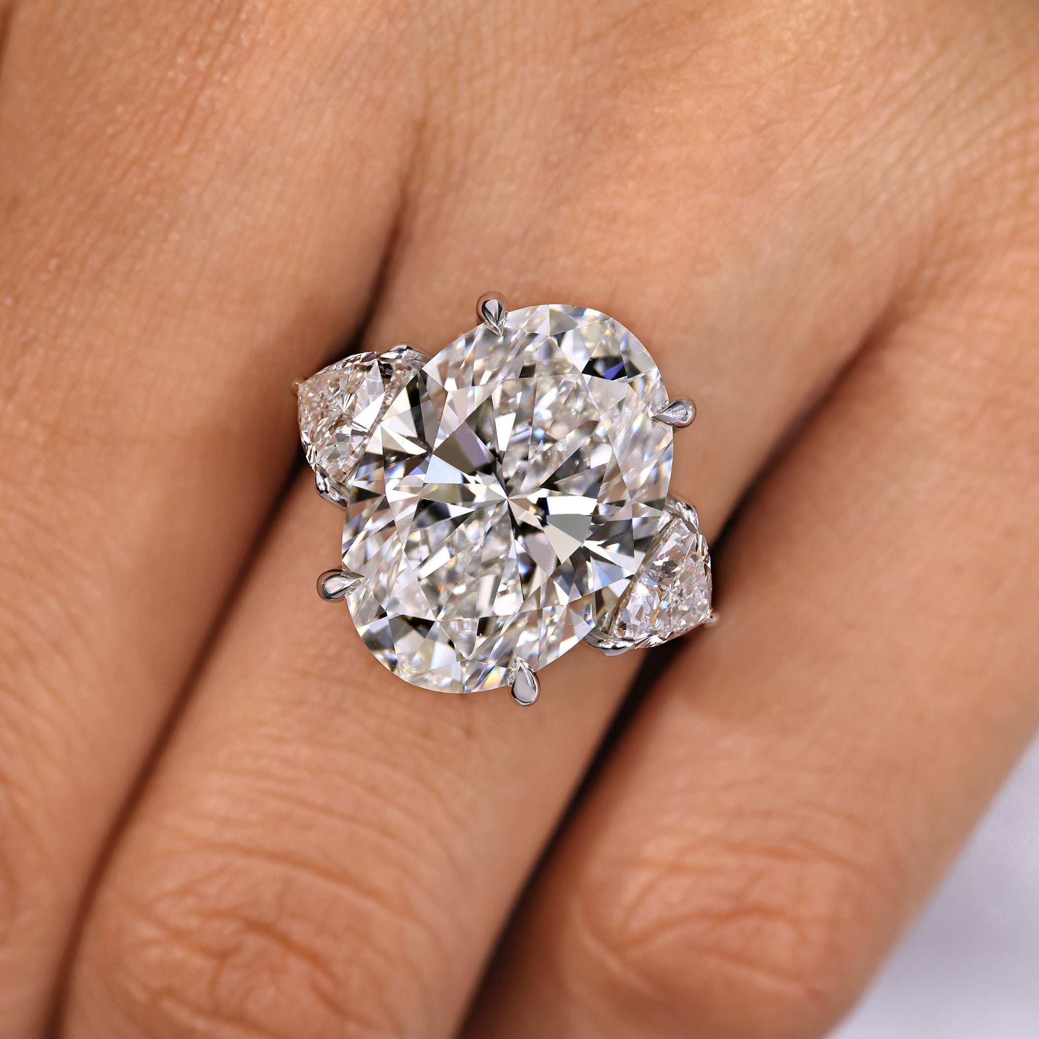 IGI Certified 10 -15 Carat Oval Diamond Ring in Three Stone Style