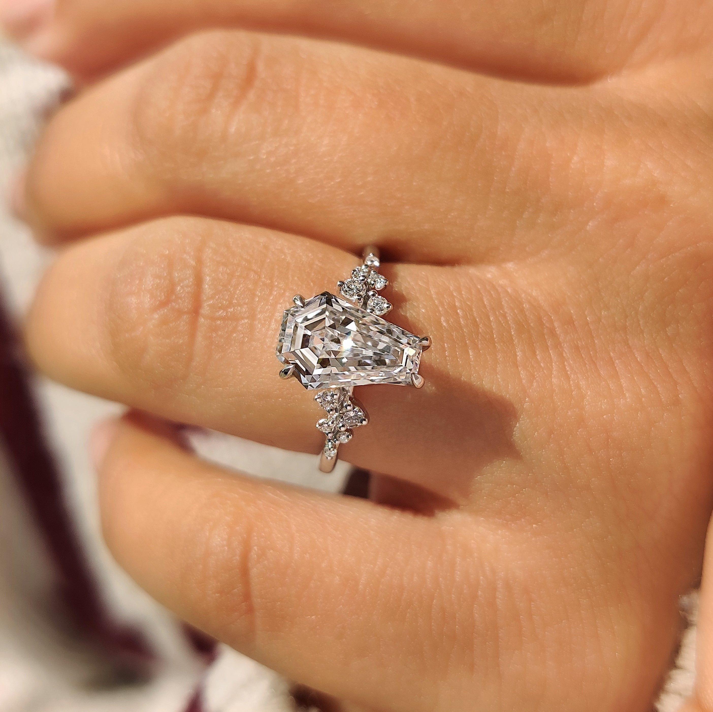 Handmade coffin diamond ring with four claw prong setting
