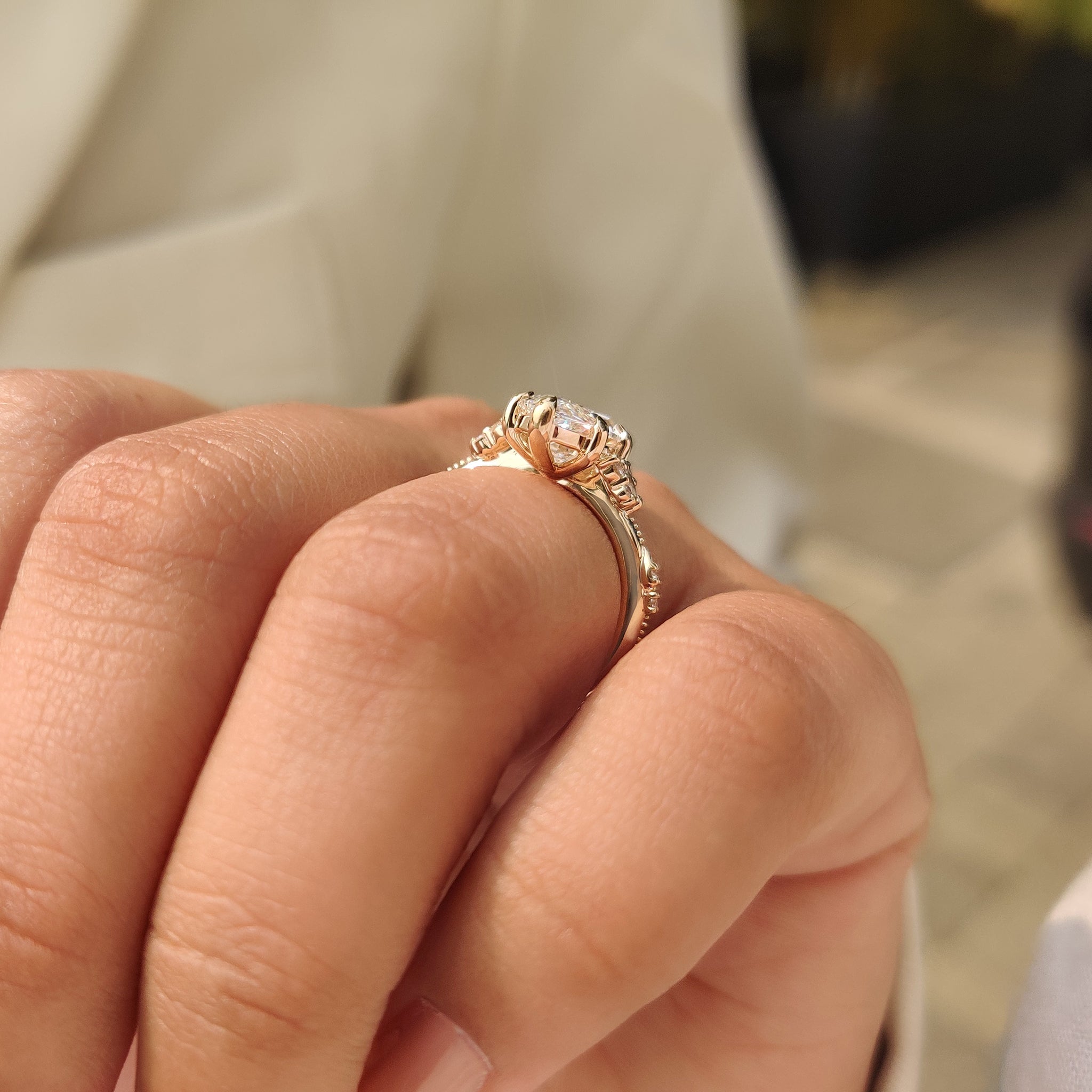 Marquise engagement ring with detailed milgrain edges
