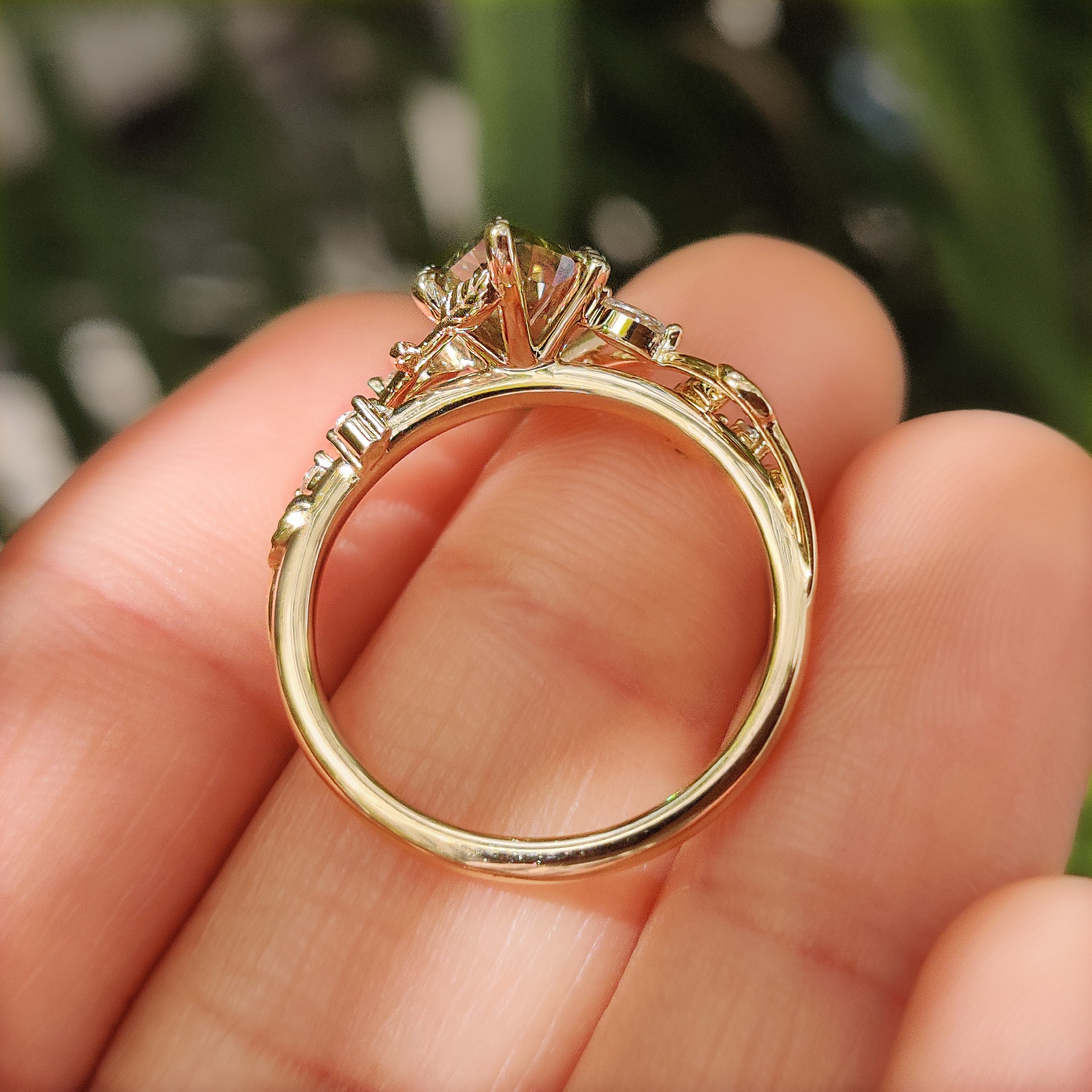 Dutch marquise engagement ring with leaf inspired cluster design
