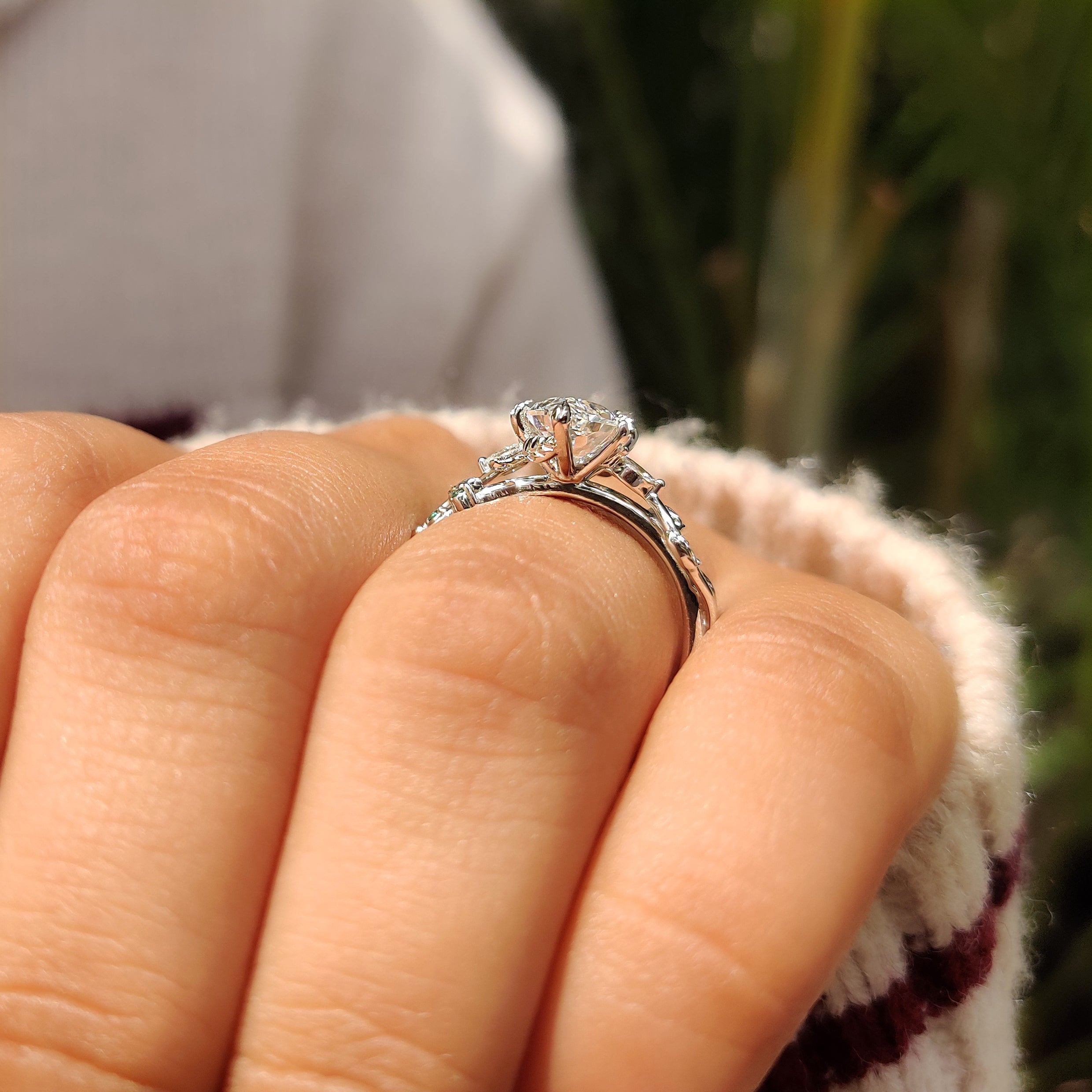 Lab grown diamond ring with marquise and emerald gemstones
