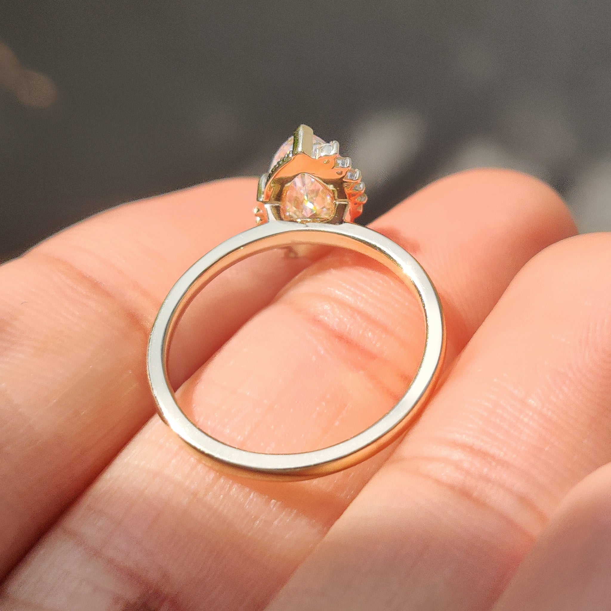 Handmade marquise diamond ring with cluster setting.
