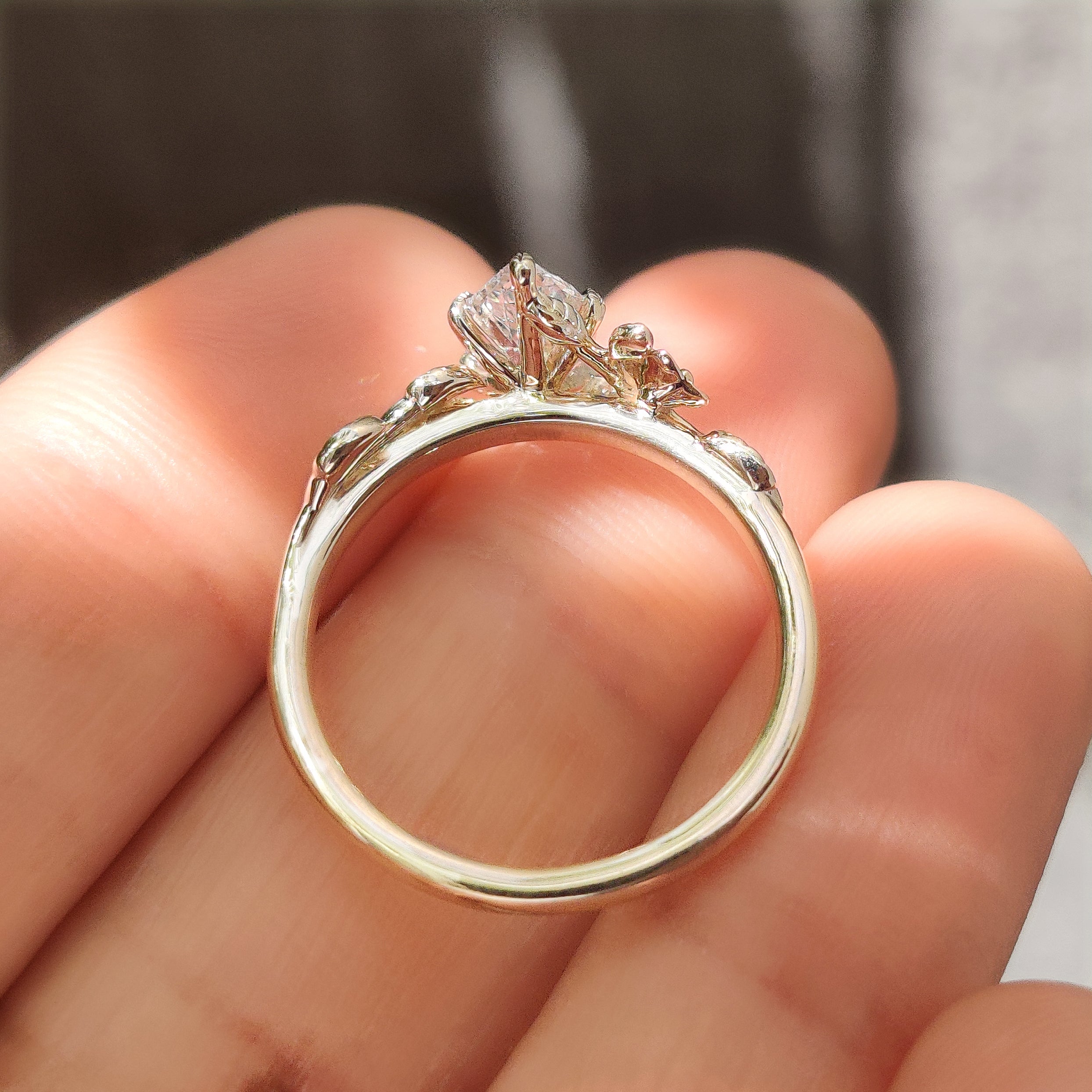 Lab grown diamond ring with six leaf style prongs
