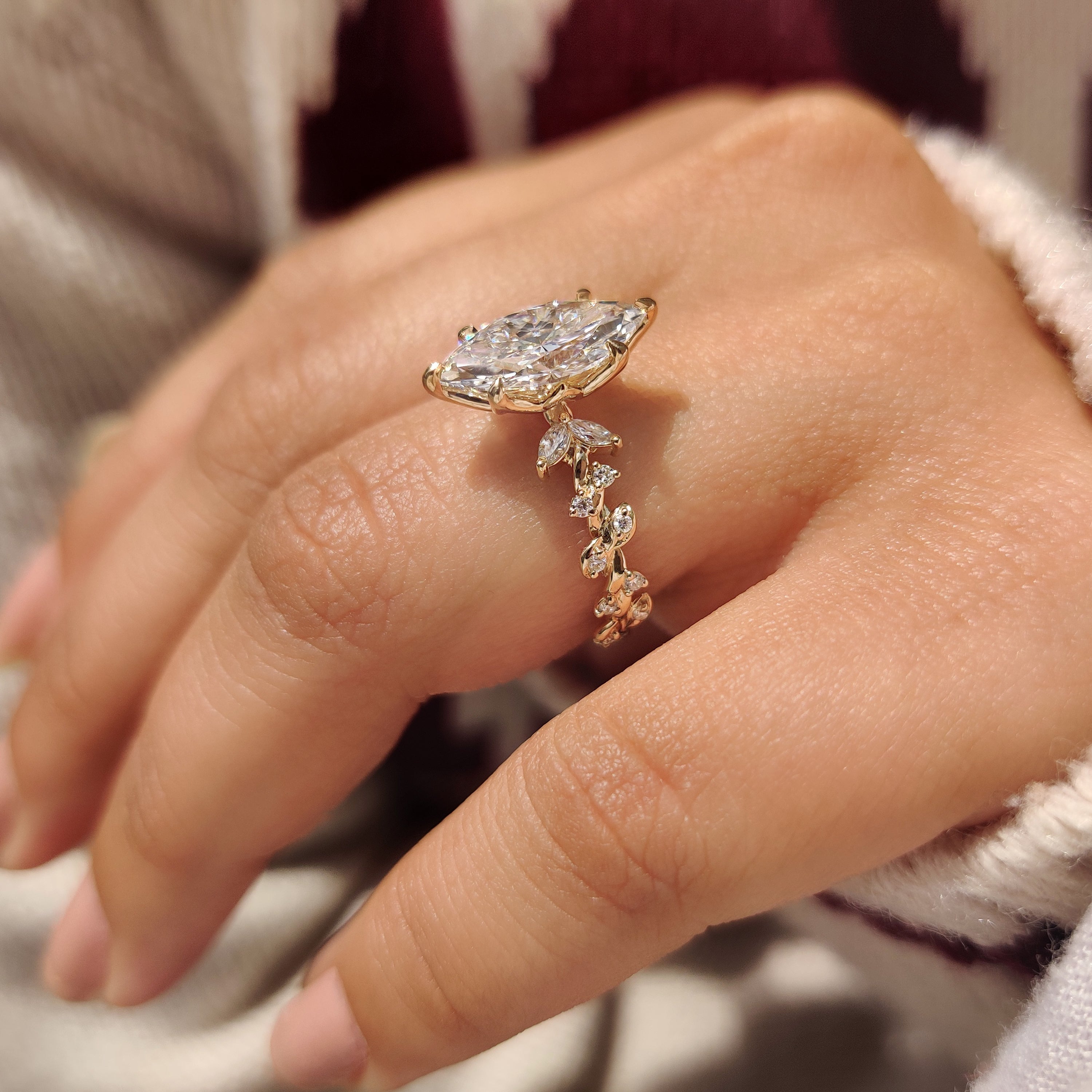 Marquise diamond ring with nature inspired style.
