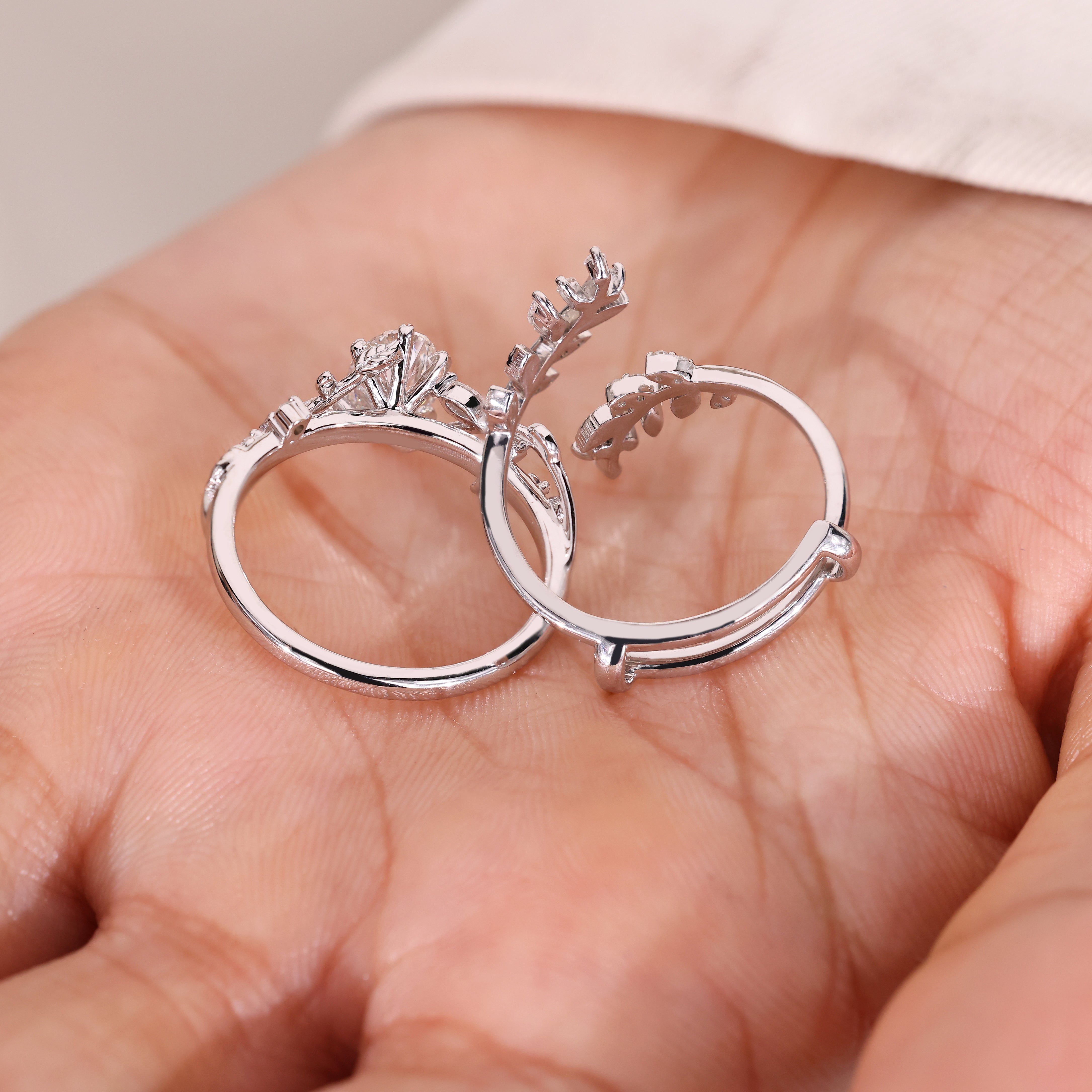 Oval Engagement Ring with Leaf Style Prong and Cluster Setting
