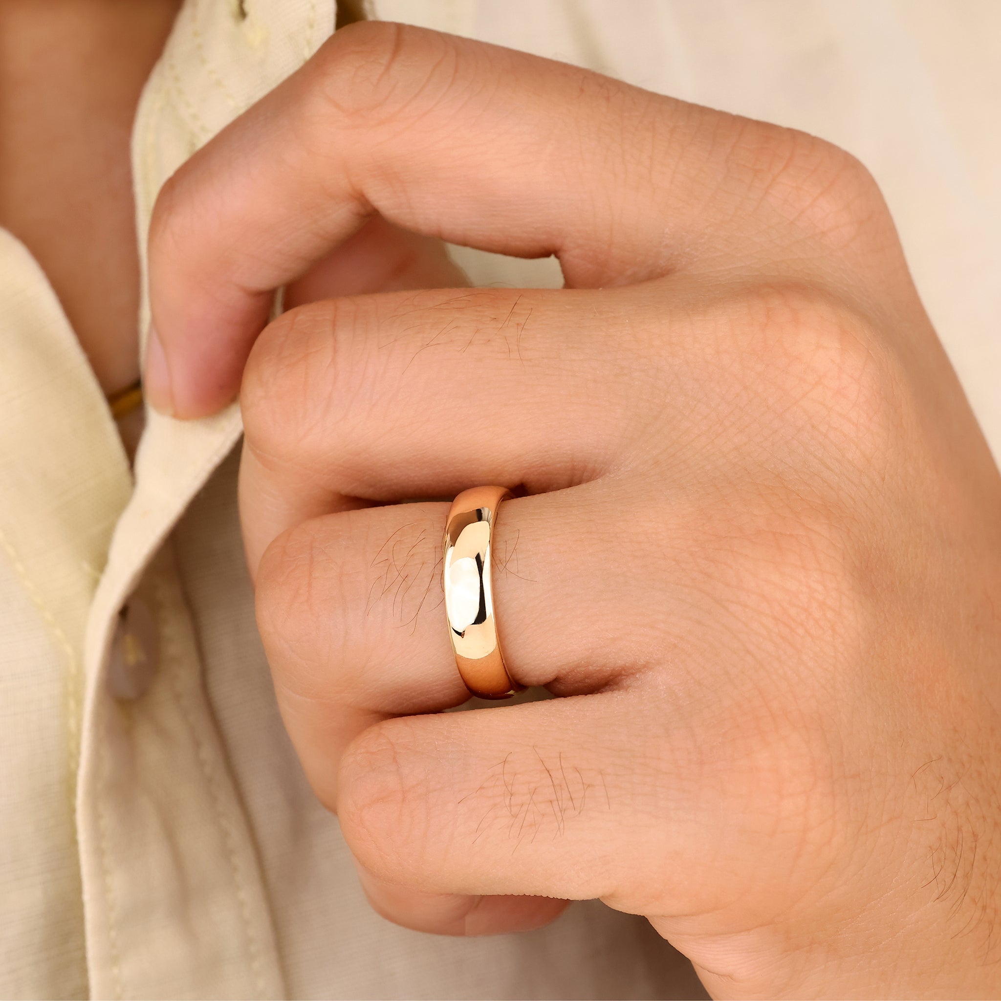 Simple mens plain wedding band crafted by Carat Diamonds.

