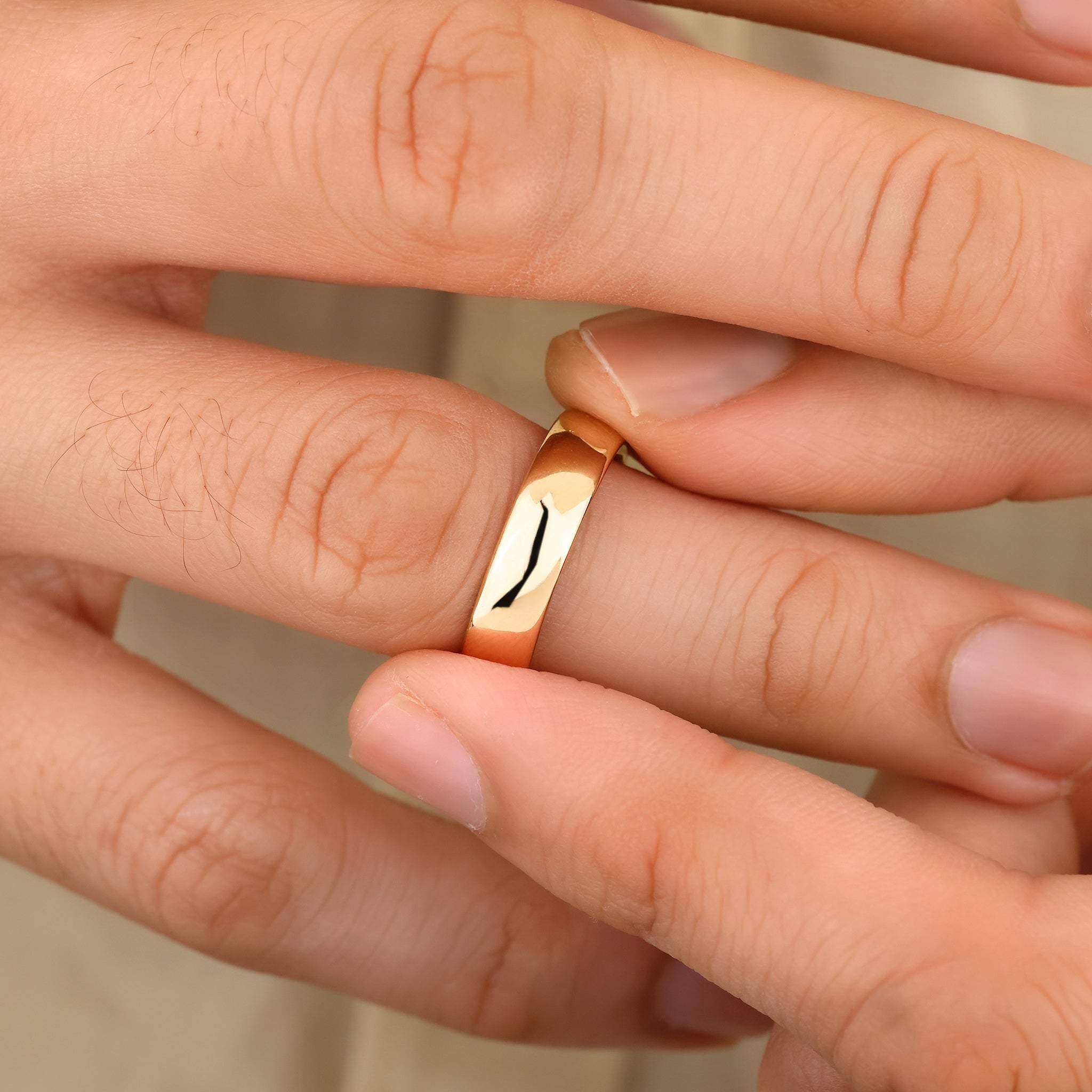 Mens wedding band with comfort fit and plain polished look.
