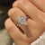 Marquise cut ring with hidden halo and side stones.
