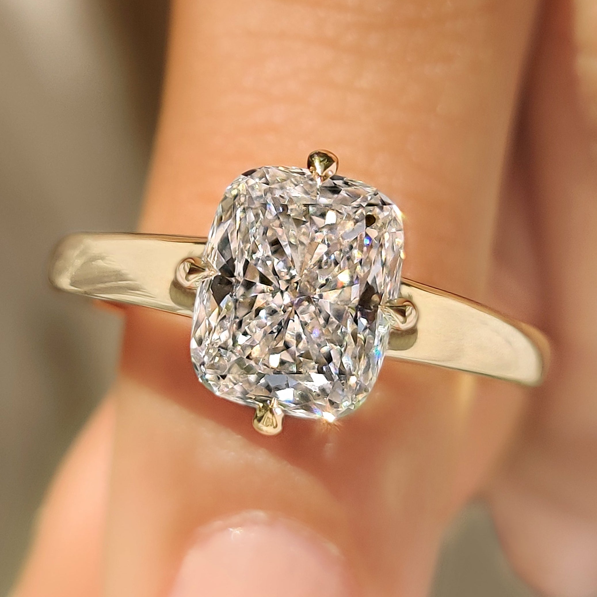Cushion cut lab grown diamond ring with solitaire style
