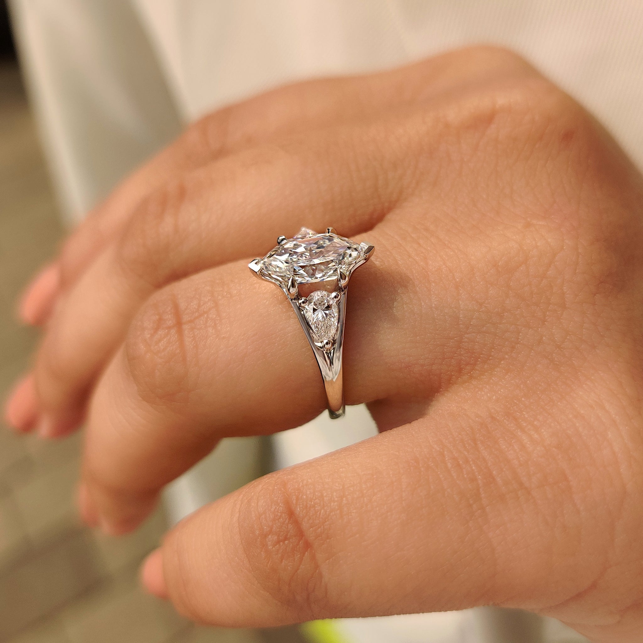 Three stone dutch marquise ring with claw prong setting.
