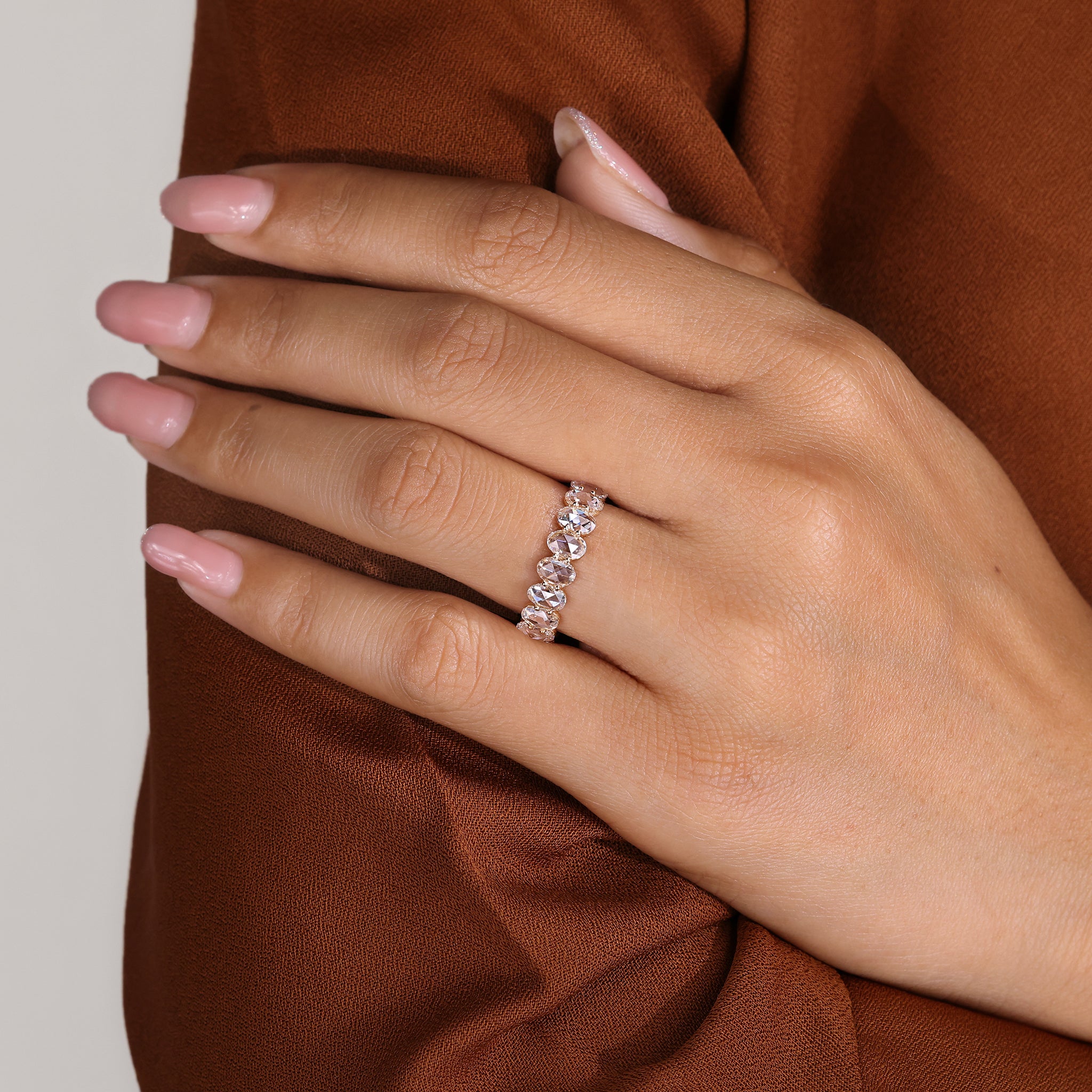 Shared prong Diamond Eternity Band with oval rose cut stones
