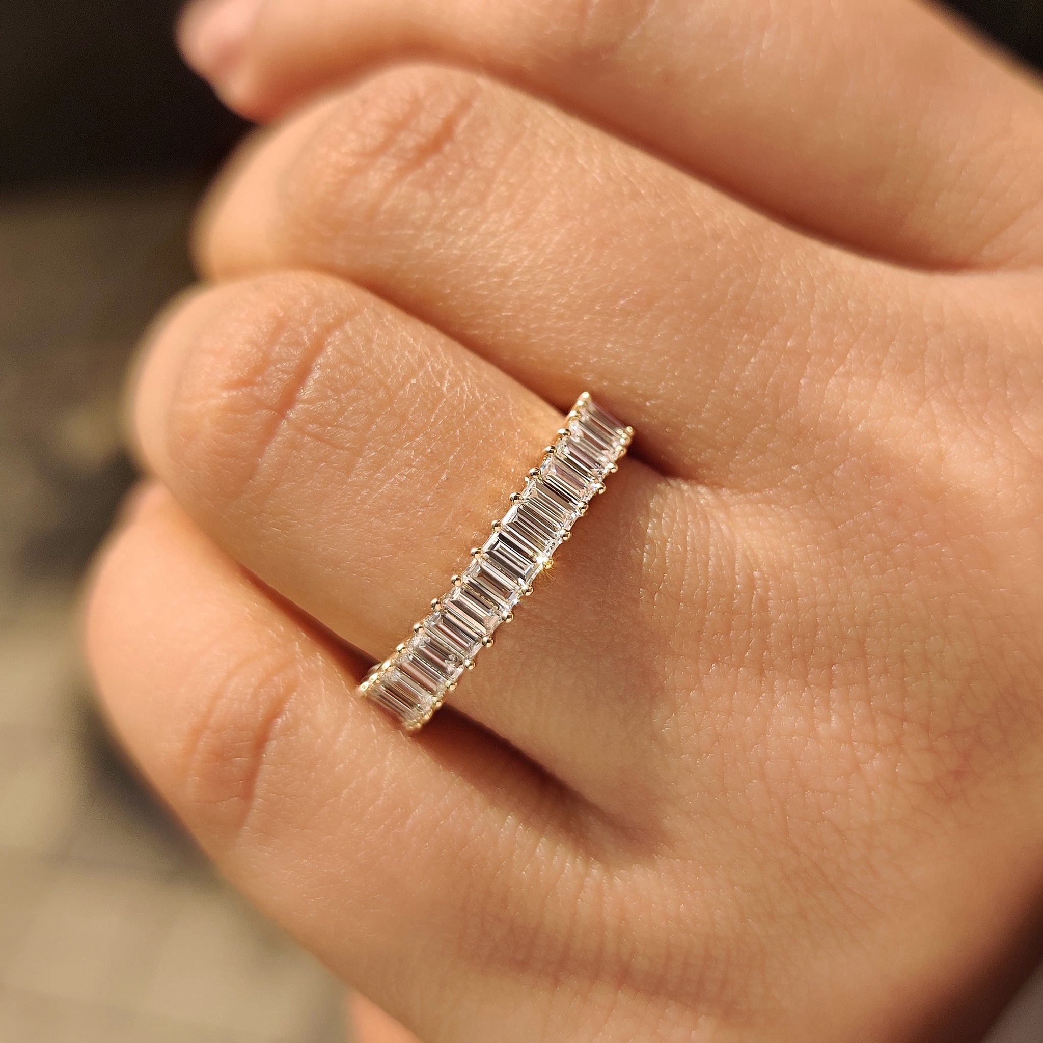Lab grown baguette diamond band with prong setting style.
