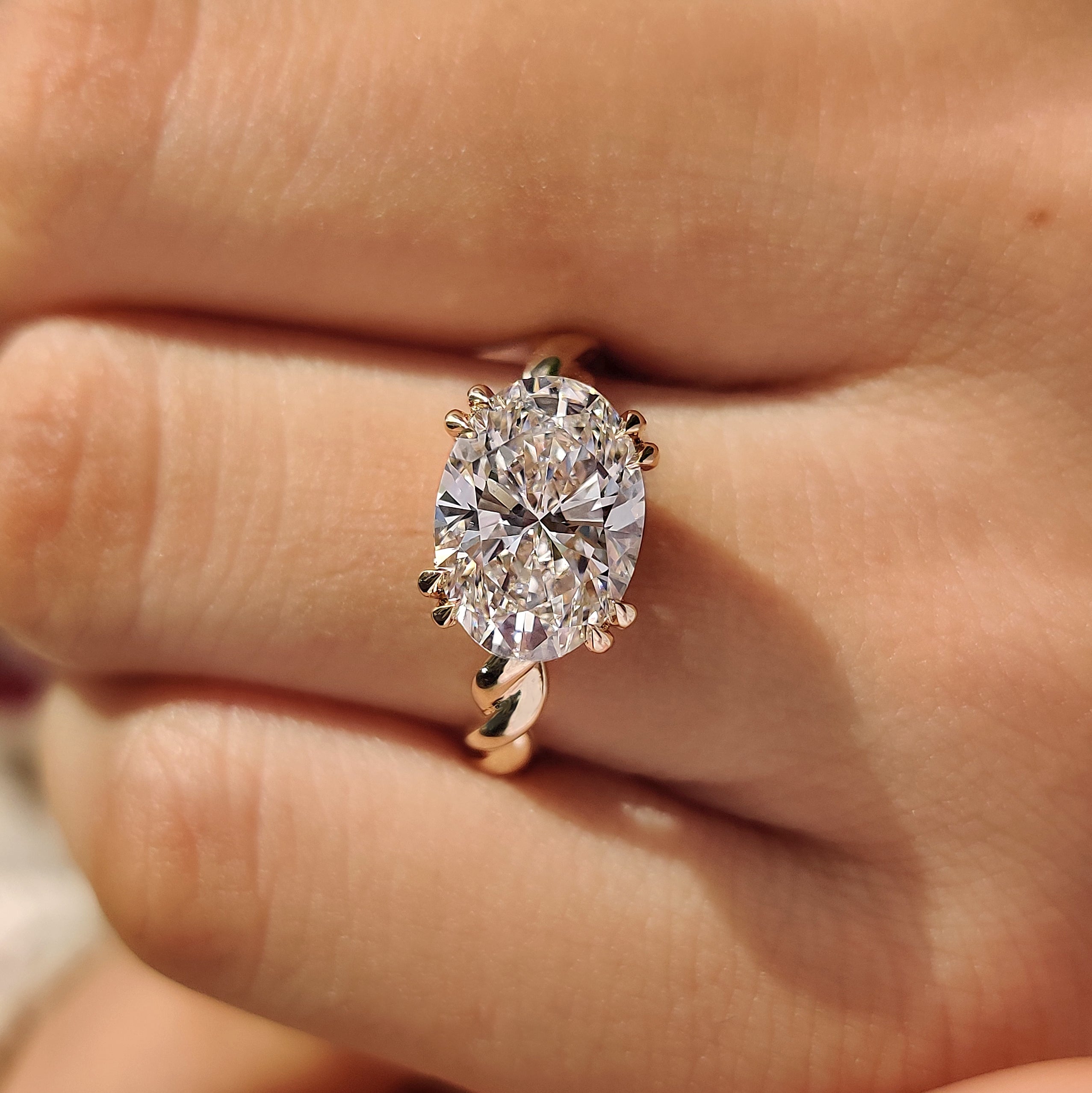 Lab grown oval diamond ring with solitaire style setting
