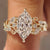 Dutch marquise ring with leaf and vine shank design
