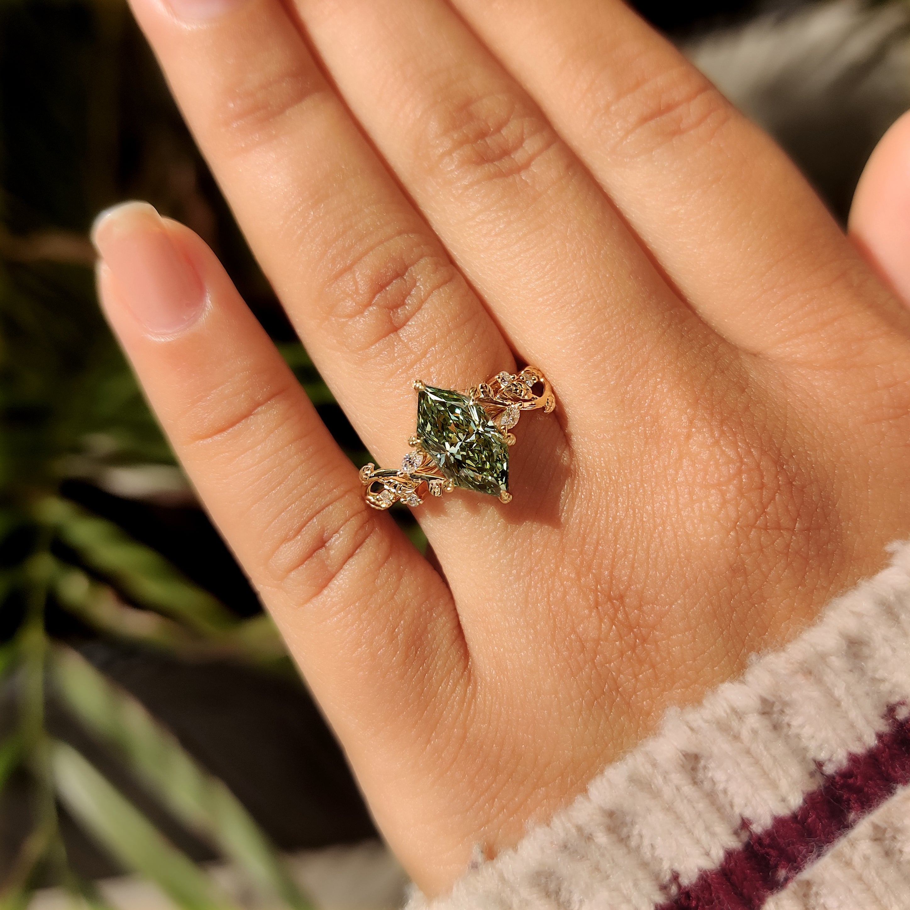 Lab grown green diamond ring with side stone accents
