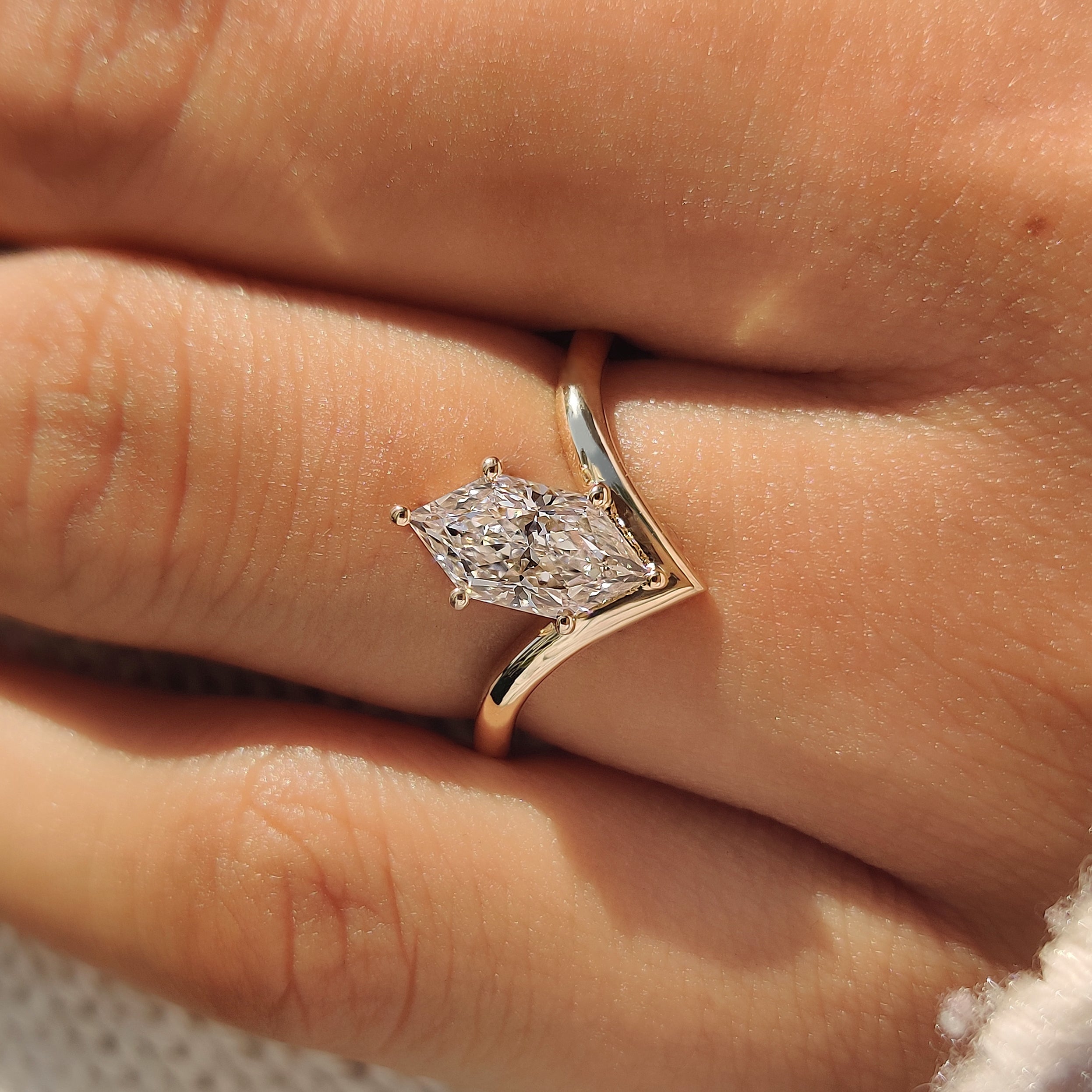 Handmade Dutch marquise solitaire engagement ring by Carat Diamonds.
