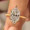 Dutch marquise engagement ring with round hidden halo.
