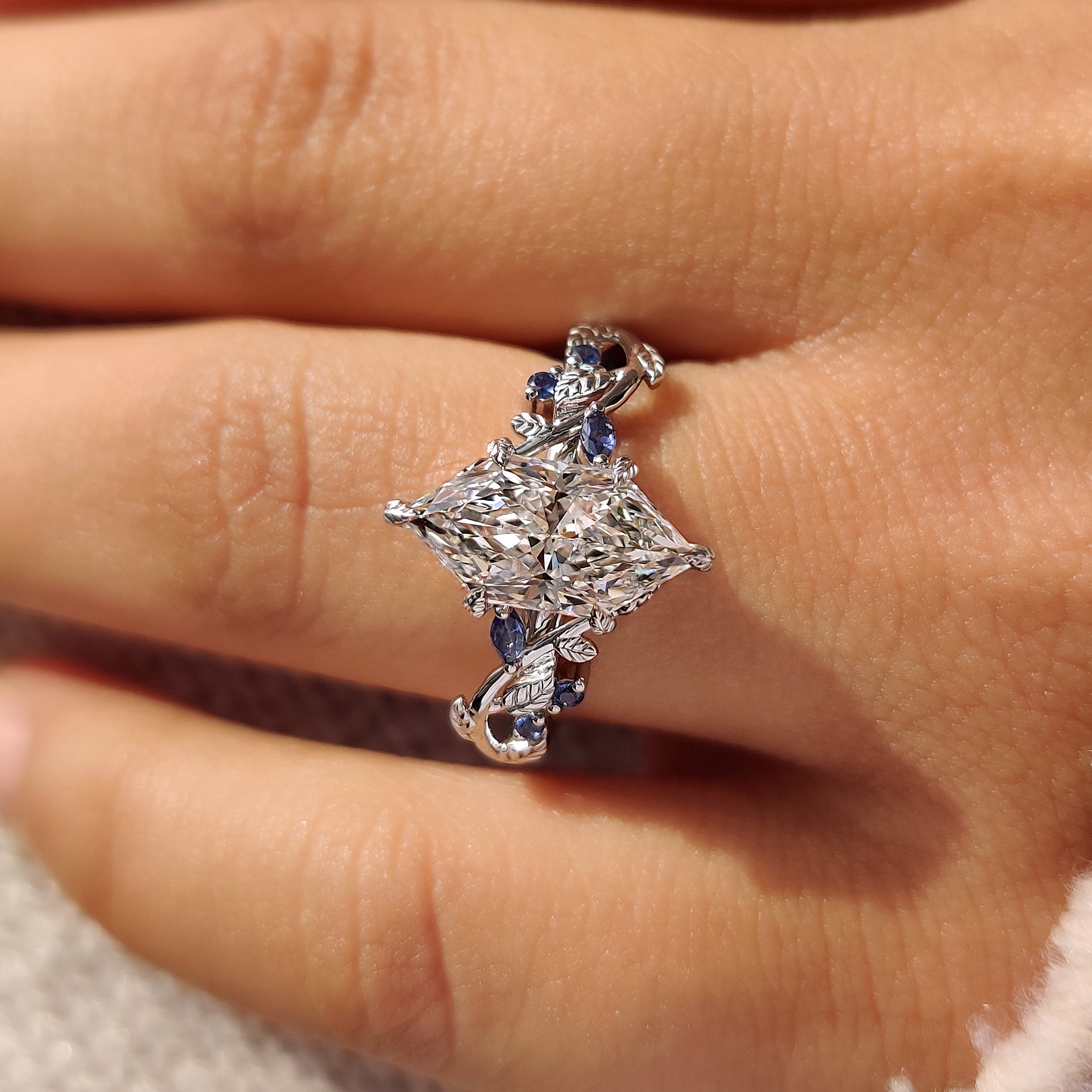 Dutch marquise diamond ring with cluster setting
