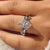 Dutch marquise diamond ring with cluster setting
