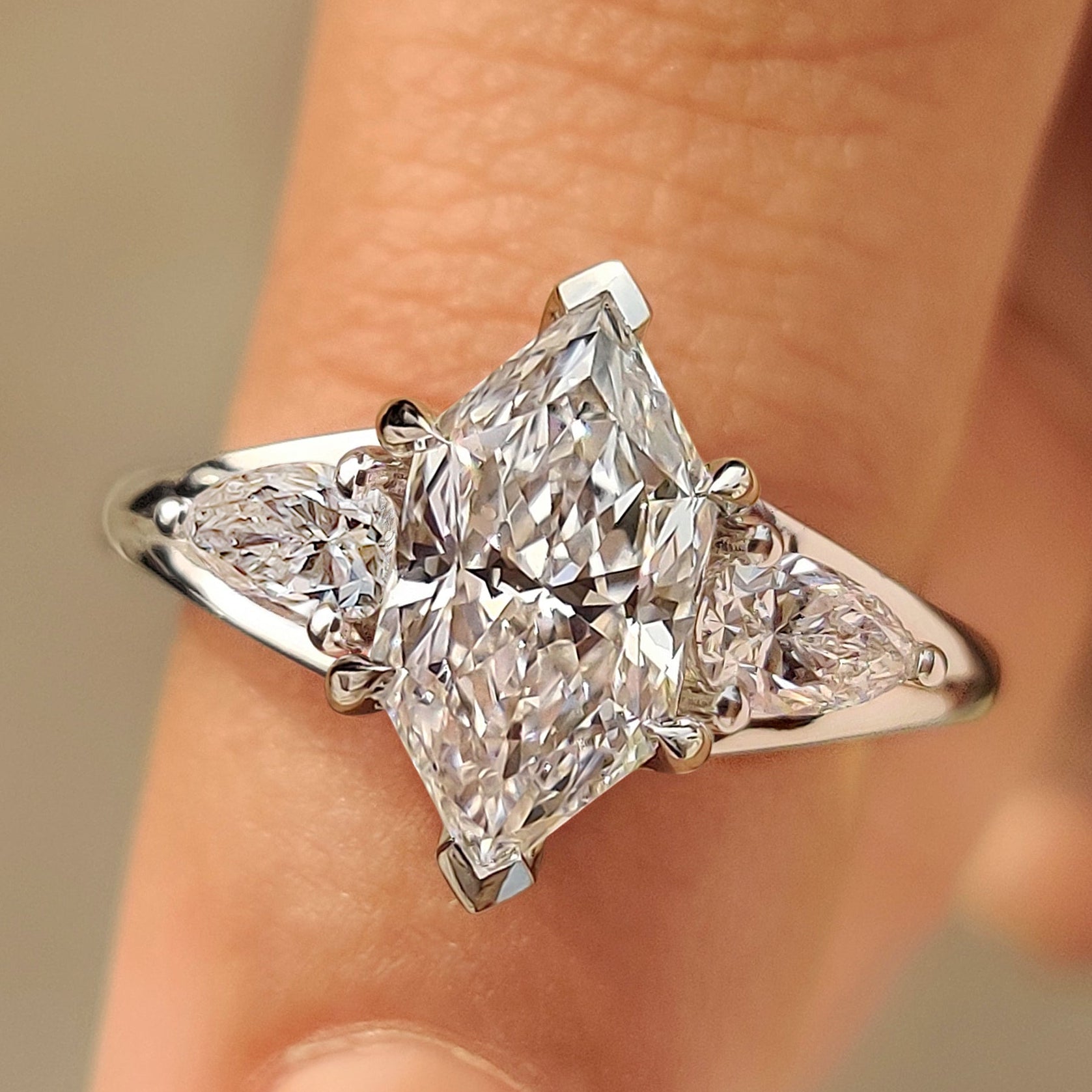 Three Stone Style Dutch Marquise Diamond Ring With Pear Side Stone