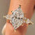 Dutch Marquise Ring with Kite and Round Side Stones