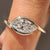 Marquise engagement ring with bypass setting
