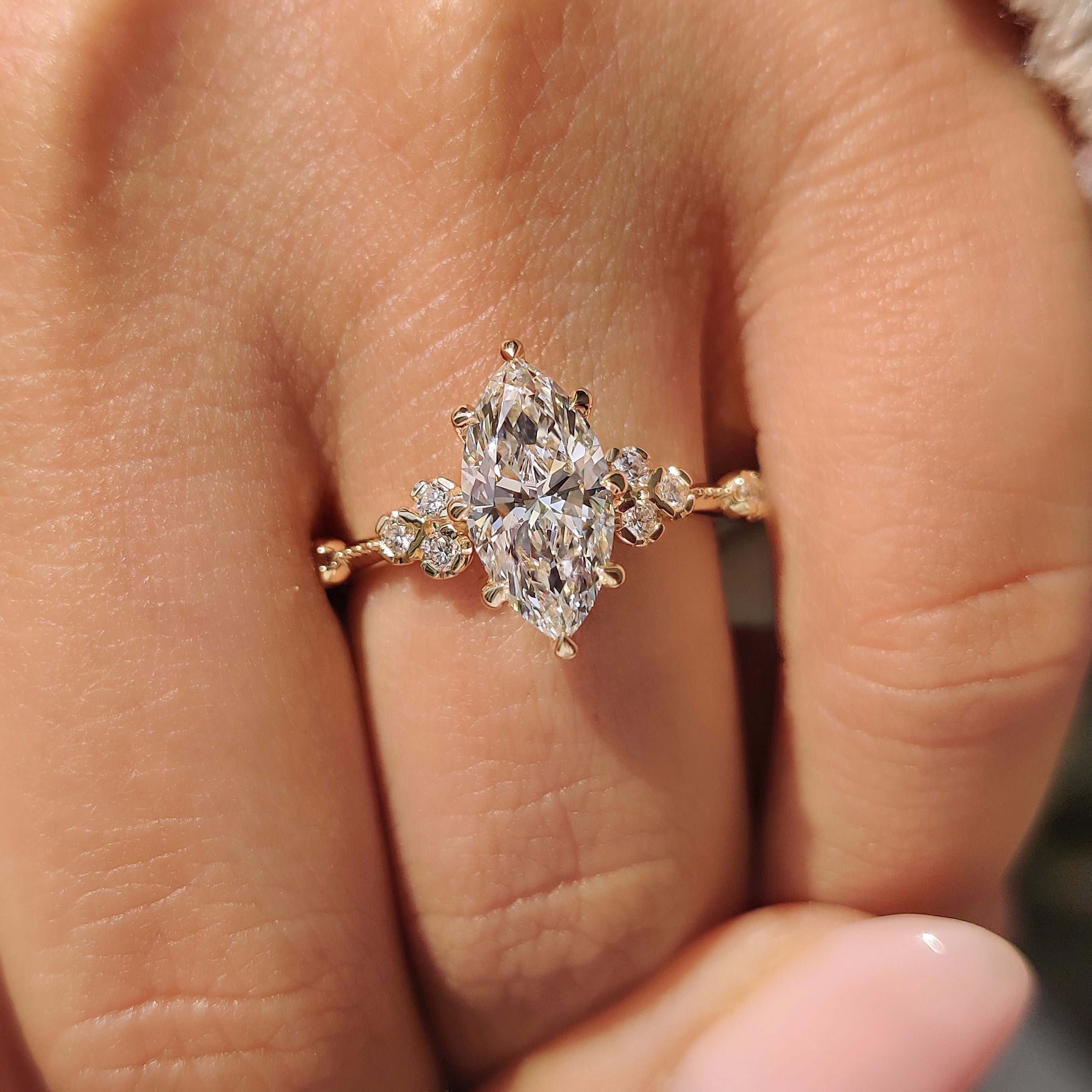 Handmade marquise diamond ring with IGI certified center stone.
