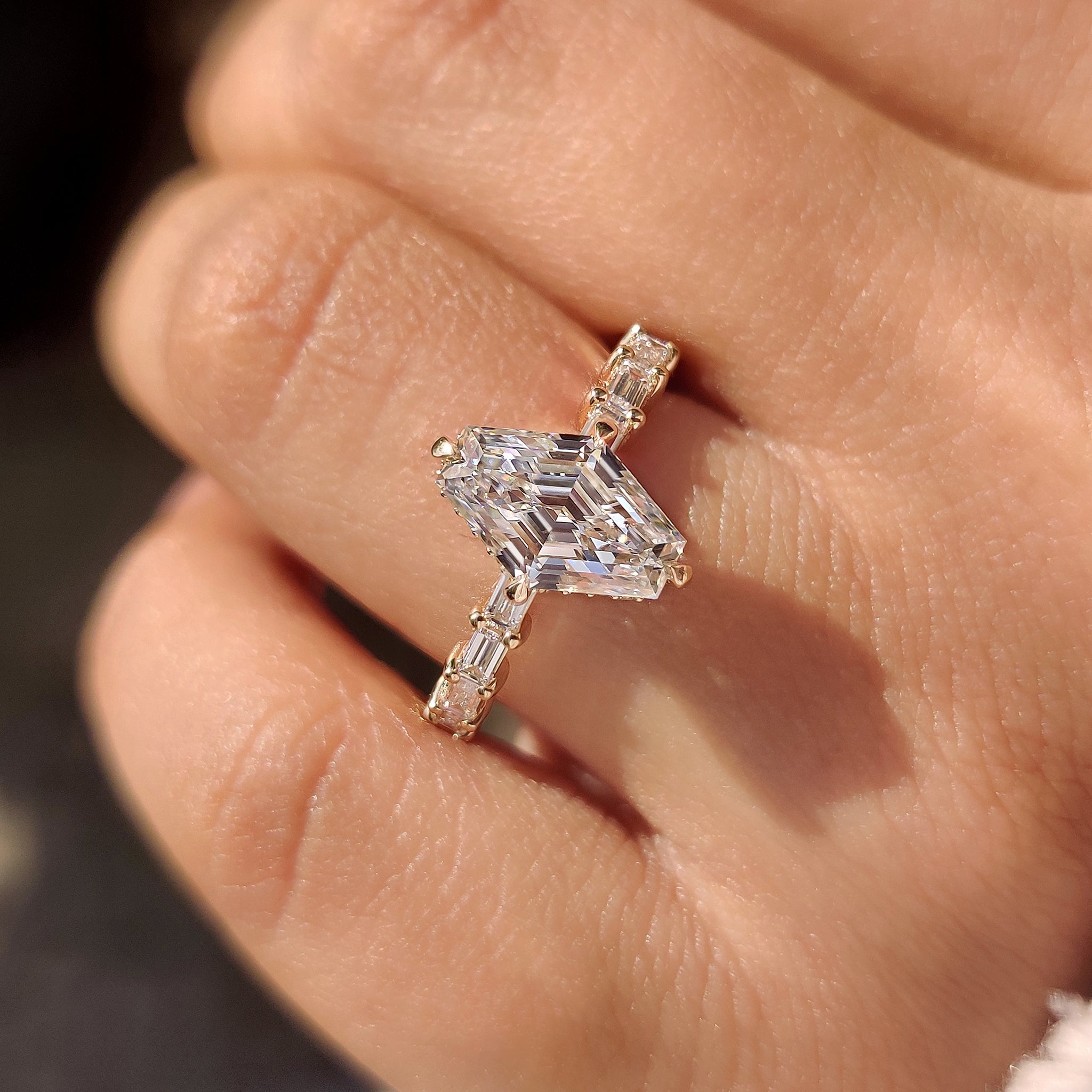 Handmade elongated hexagon ring with compass claw prong setting.

