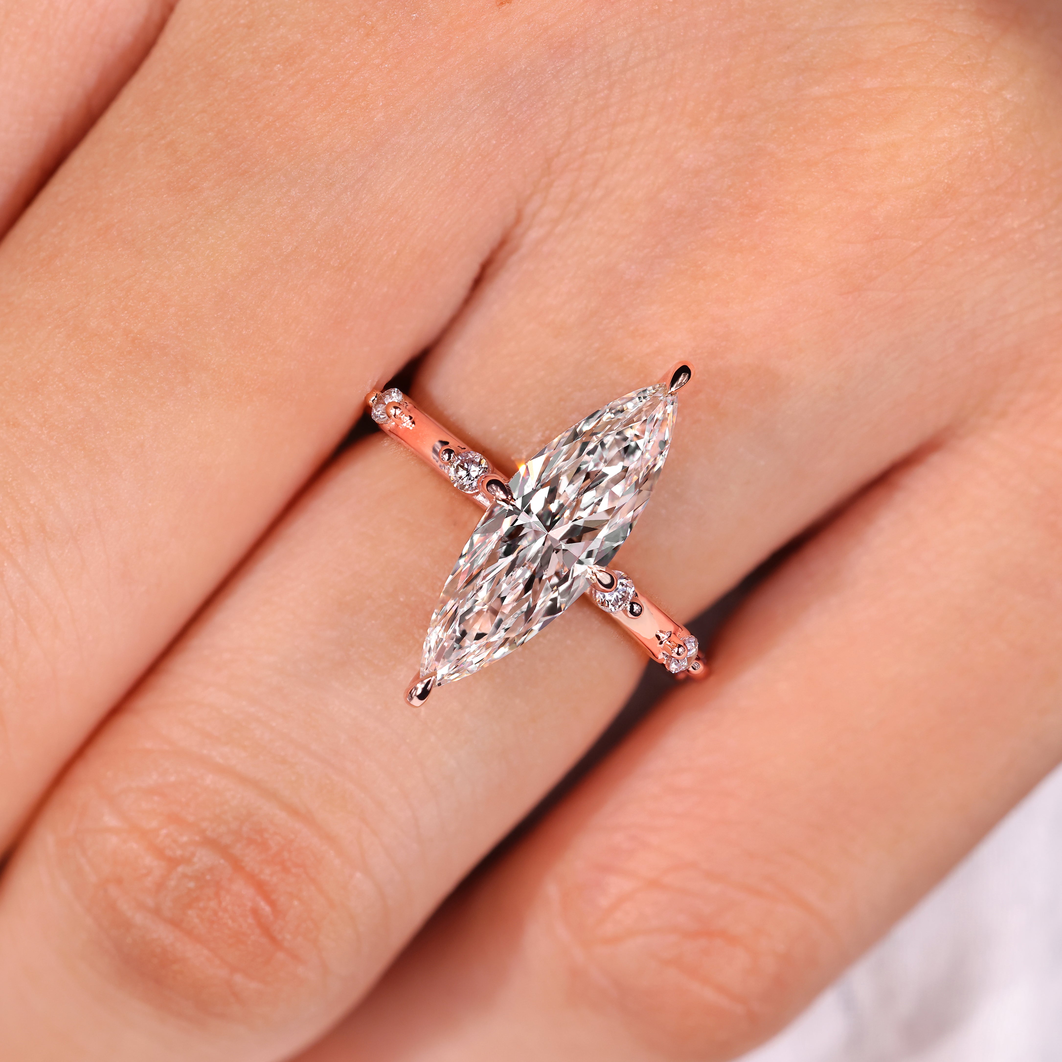 Handmade marquise diamond ring with seven stone arrangement
