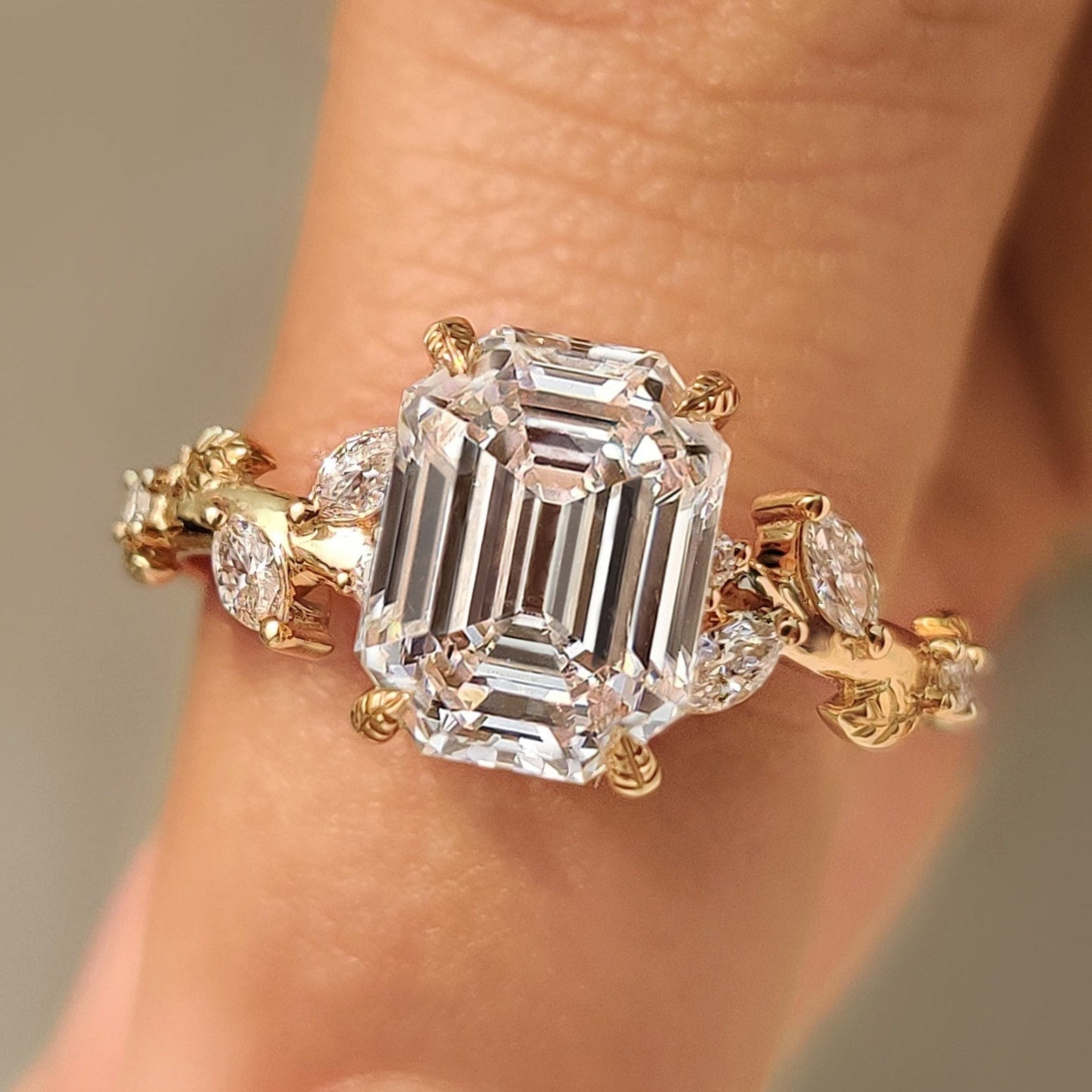 Nature inspired ring with old mine emerald cut diamond
