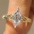 Hexagon step lab grown diamond solitaire ring with milgrain details
