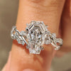 Coffin cut lab grown diamond ring with cluster setting.
