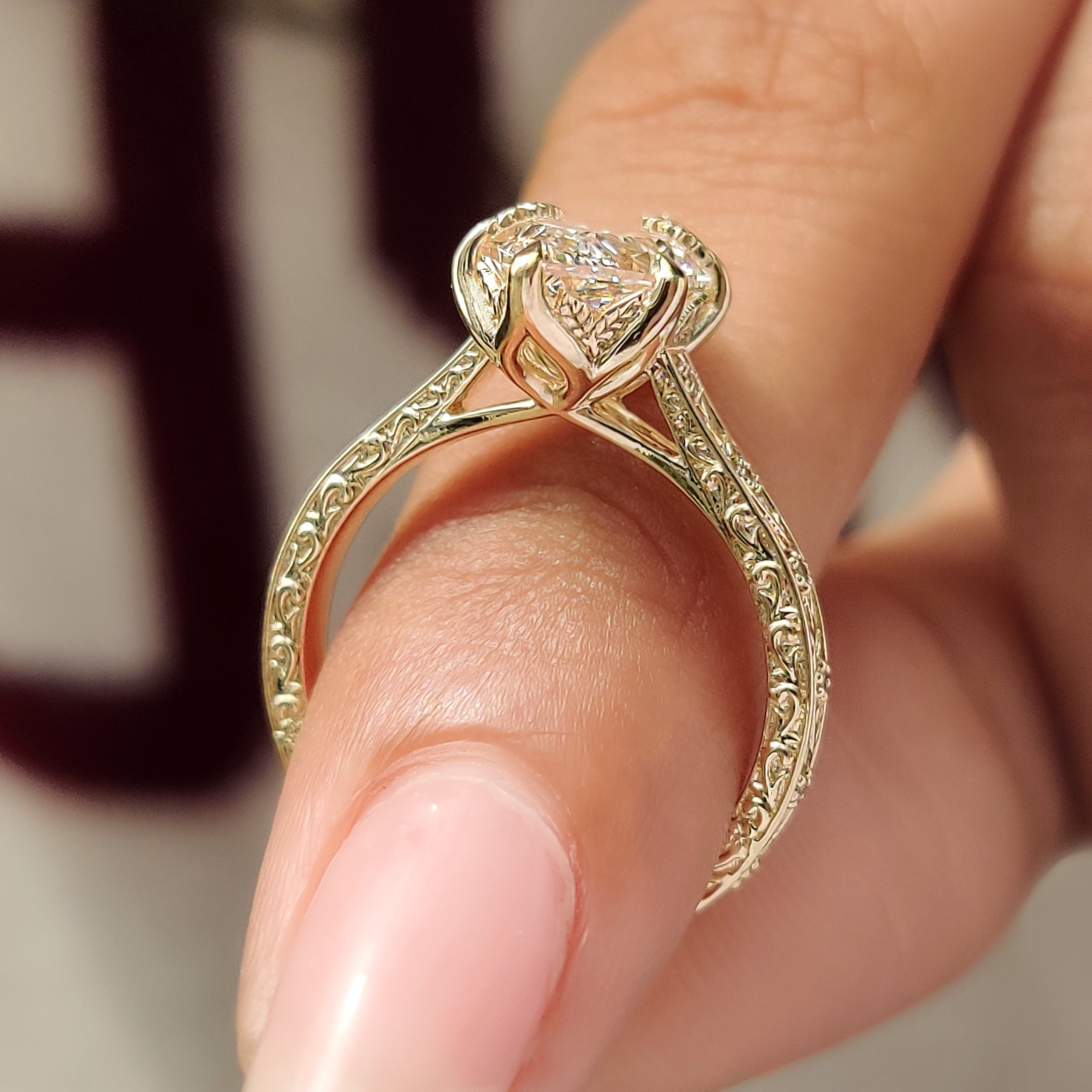 Round diamond accents on Dutch marquise ring
