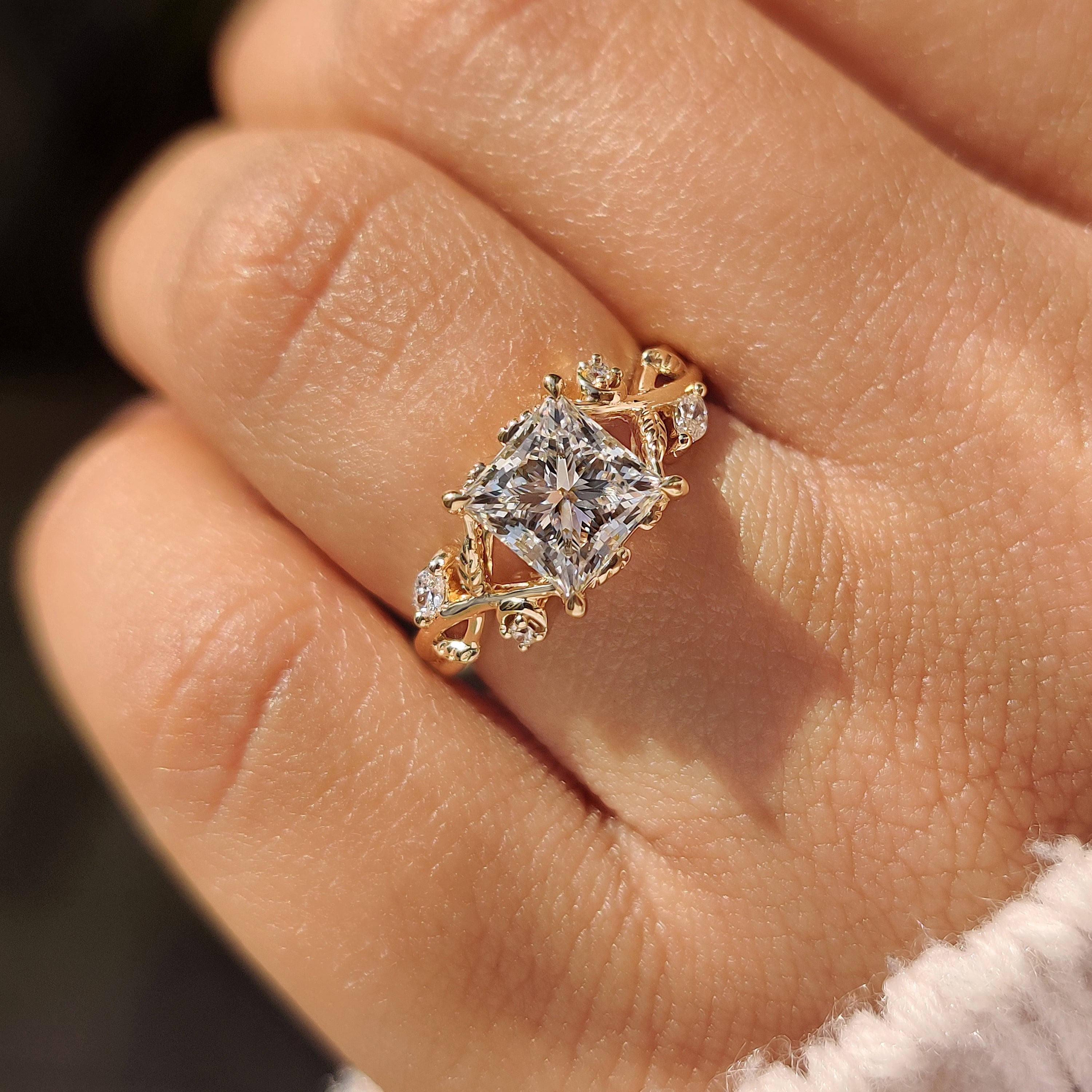 Nature inspired princess ring with leaf and petal details.
